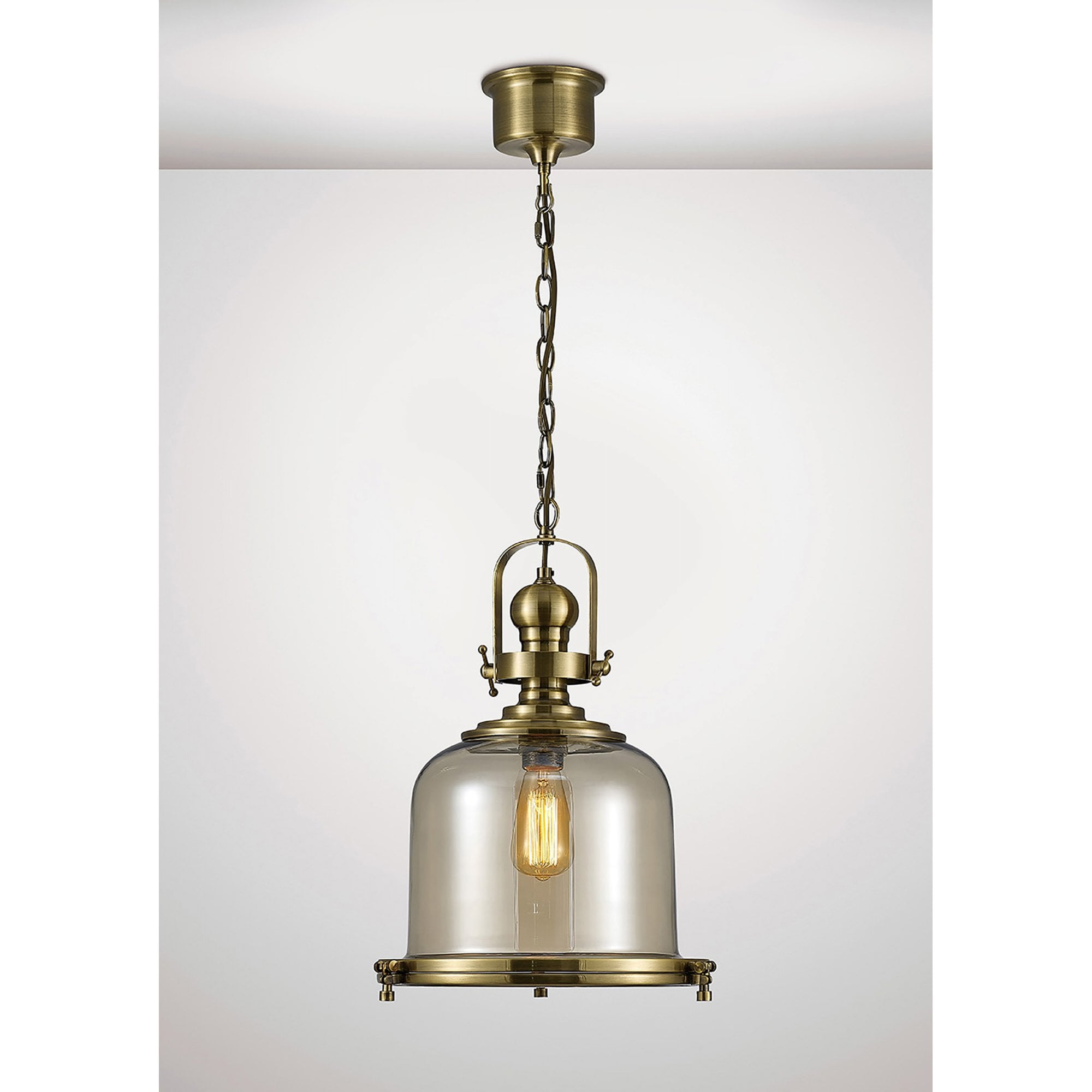 Diyas IL31594 Riley Single Medium Bell Pendant 1 Light E27 Antique Brass/Cognac Glass