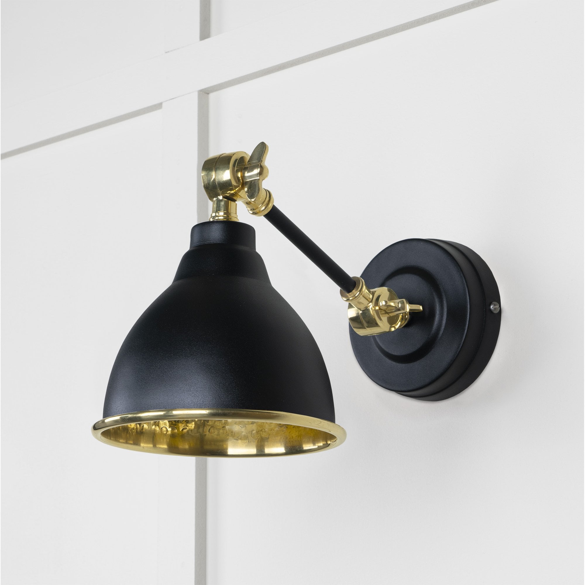 From The Anvil Hammered Brass Brindley Wall Light - Elan Black