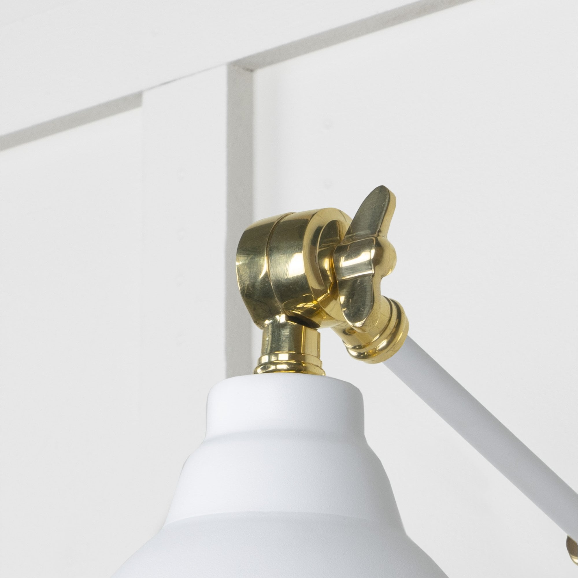 From The Anvil Hammered Brass Brindley Wall Light - Flock (Matt White)
