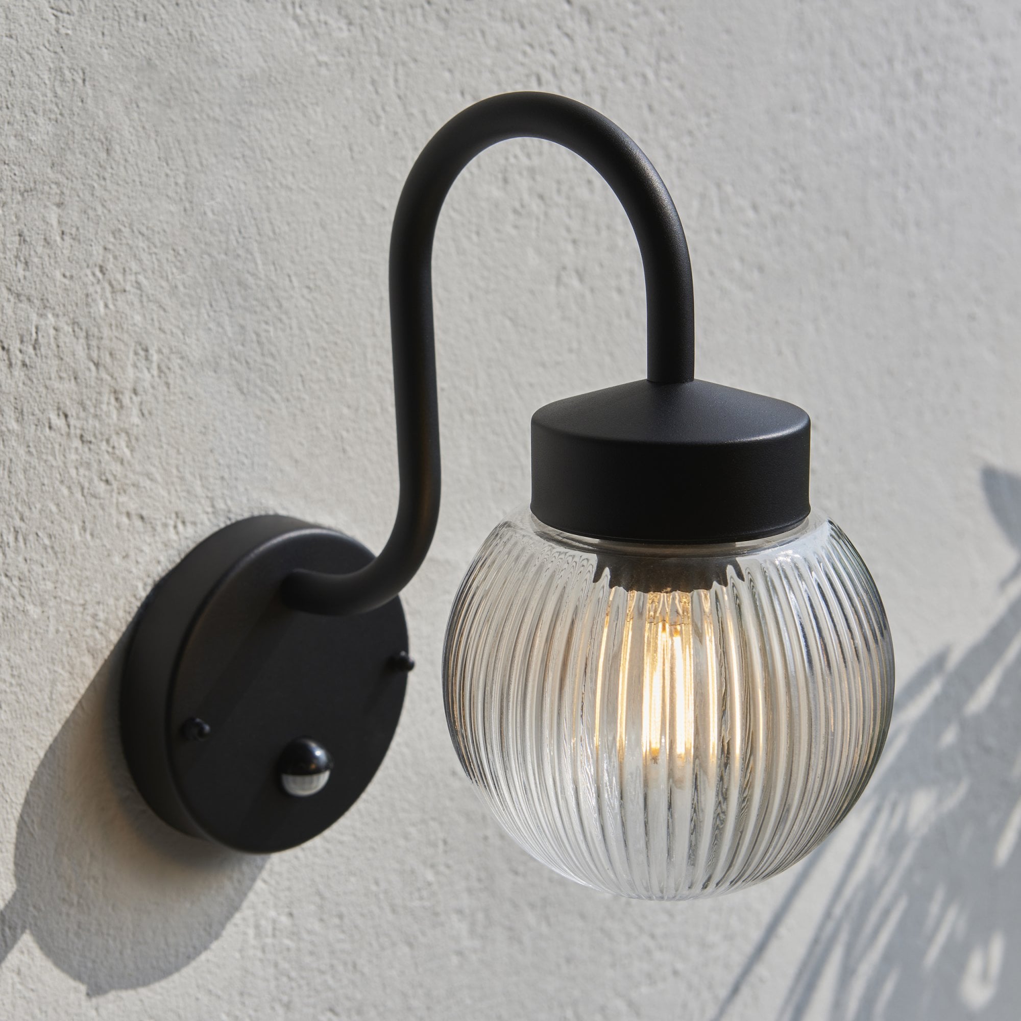 Endon Eldon Single Wall Light with PIR - Textured Black & Clear Ribbed Glass