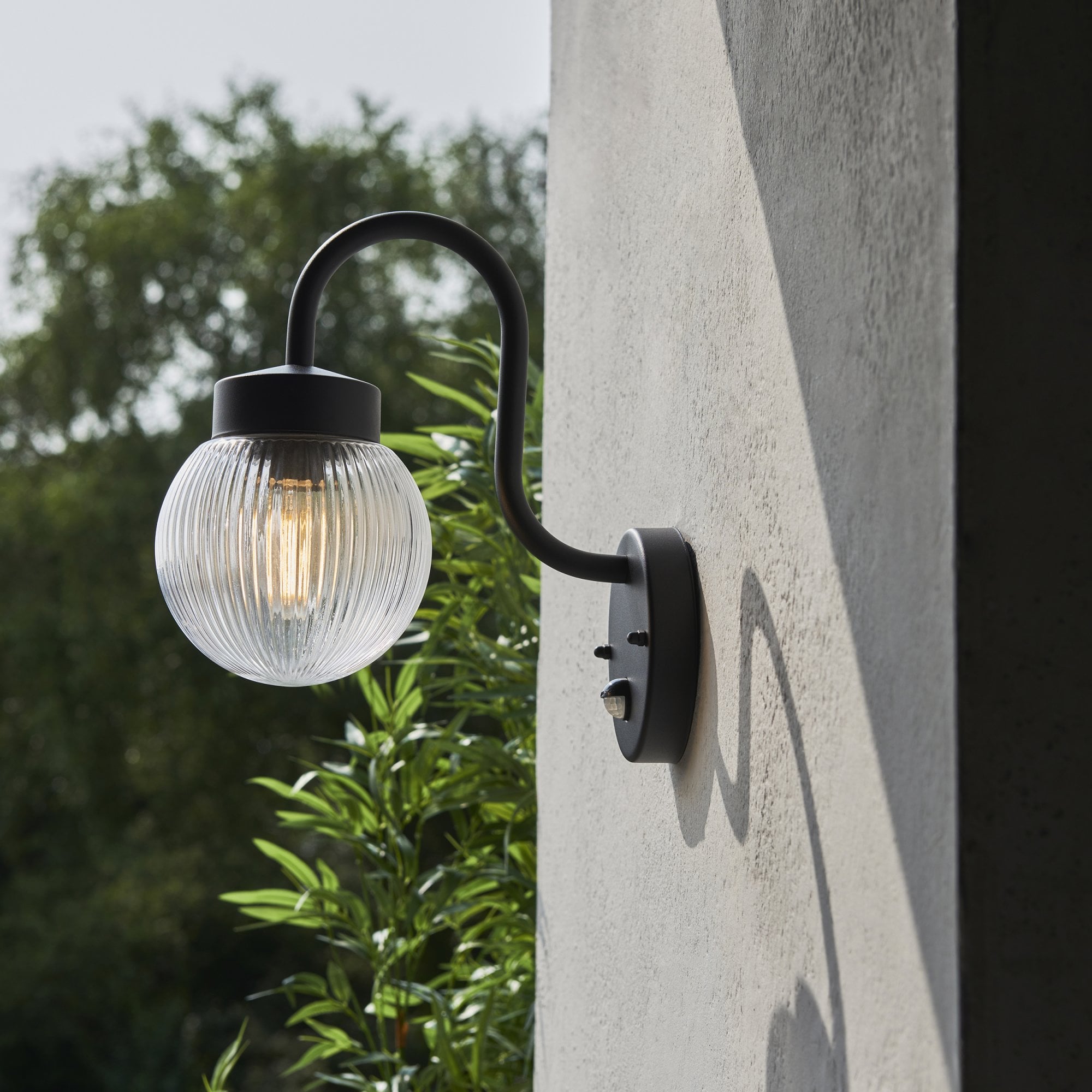 Endon Eldon Single Wall Light with PIR - Textured Black & Clear Ribbed Glass