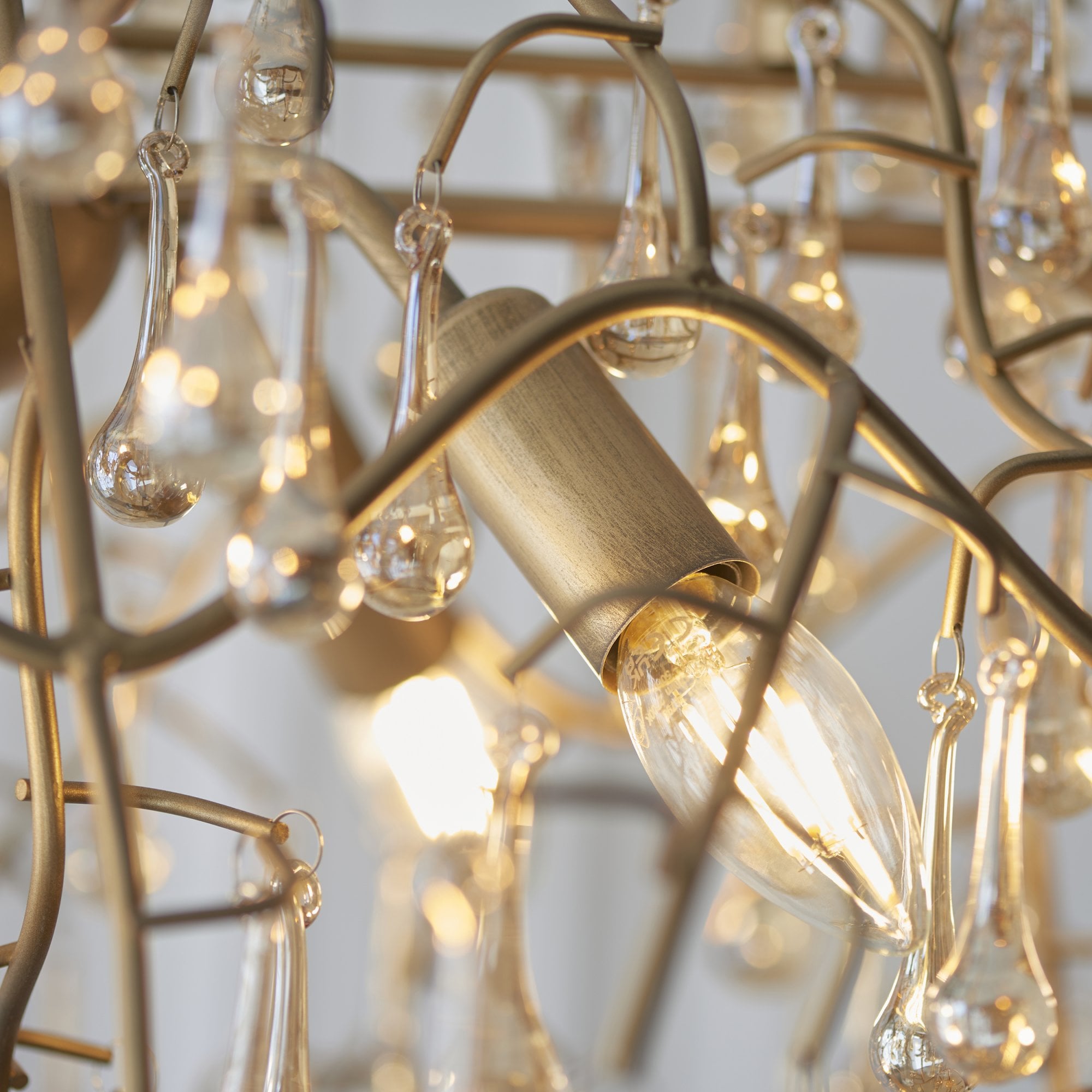 Utopia Drip 6 Light Linear Chandelier - Aged Gold Paint & Champagne Lustre Glass