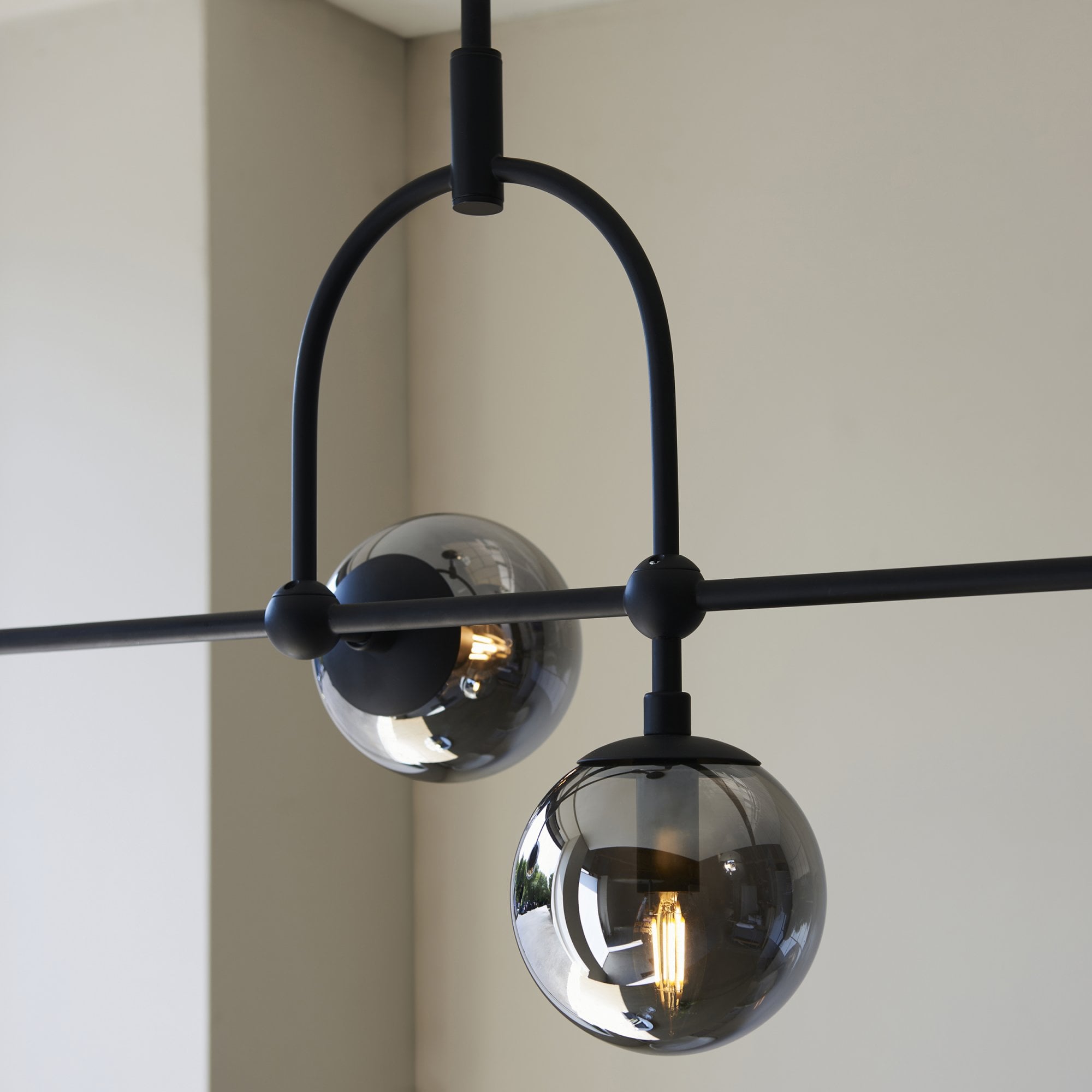 Utopia Sphere 5 Light Linear Pendant - Matt Black & Smoked Mirror Glass