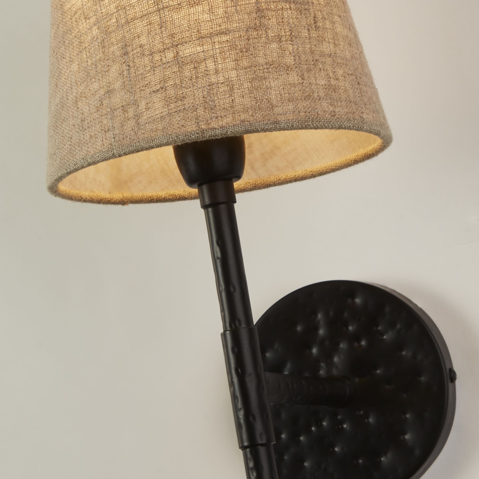 Searchlight Gibson Wall Light - Hammered Black Metal & Natural Linen