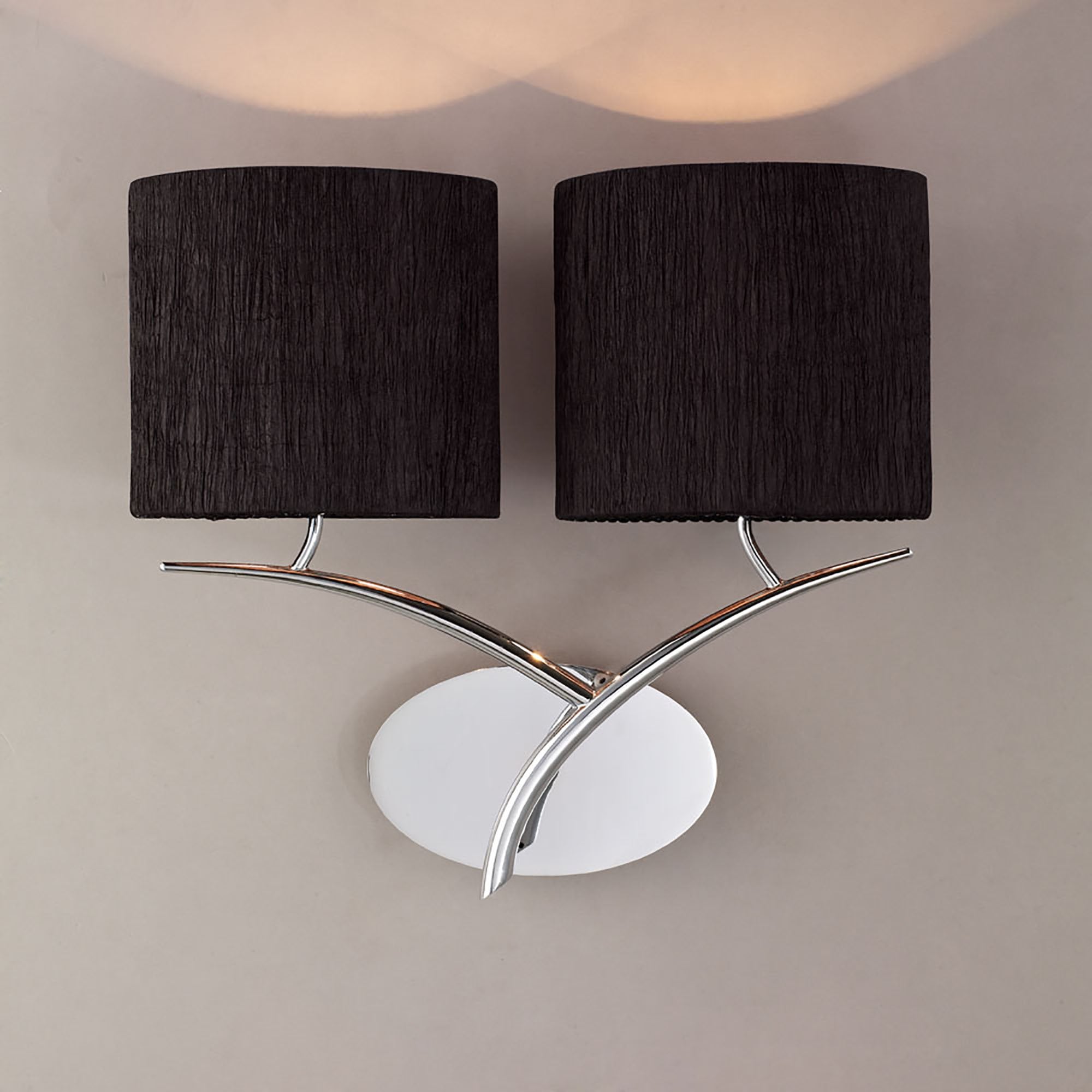 Mantra Eve 2 Light Switched Wall Fitting in Polished Chrome with Black Oval Shades