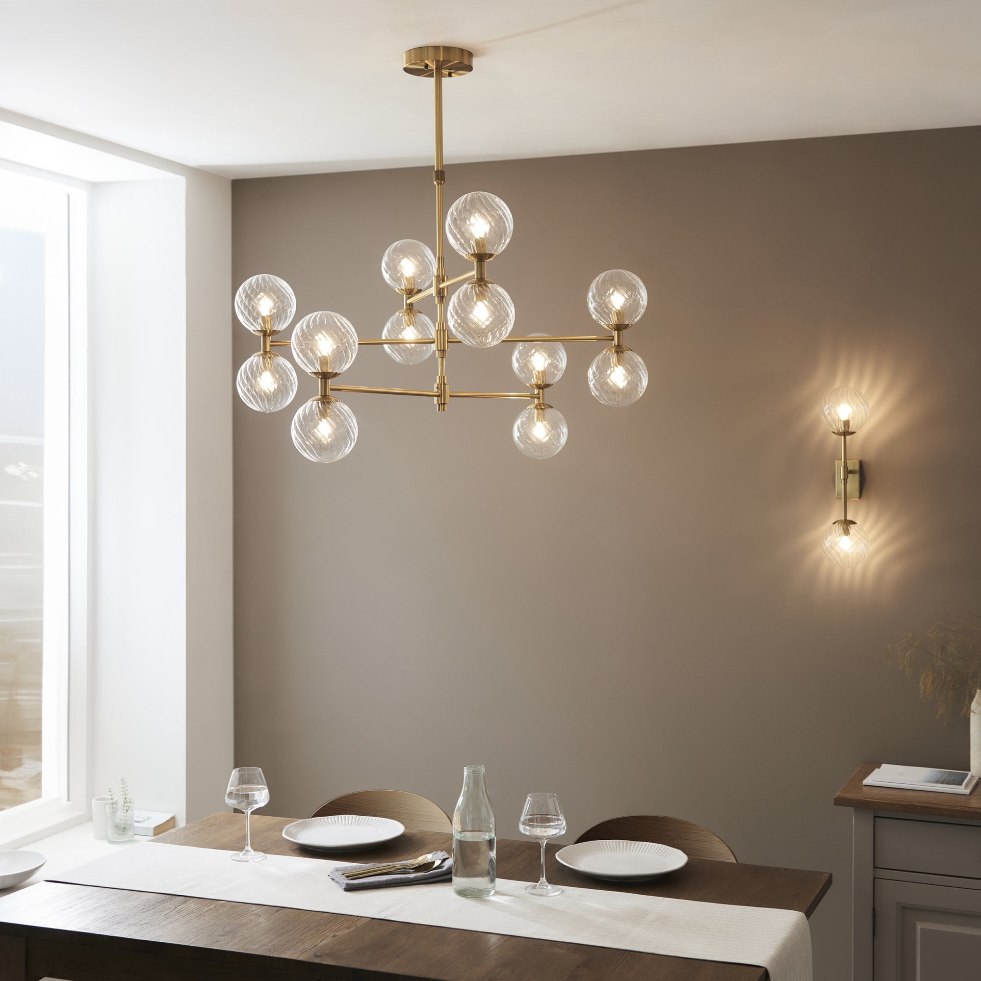 Utopia Atomic 12 Light Pendant - Brushed Aged Brass & Twisted Clear Glass