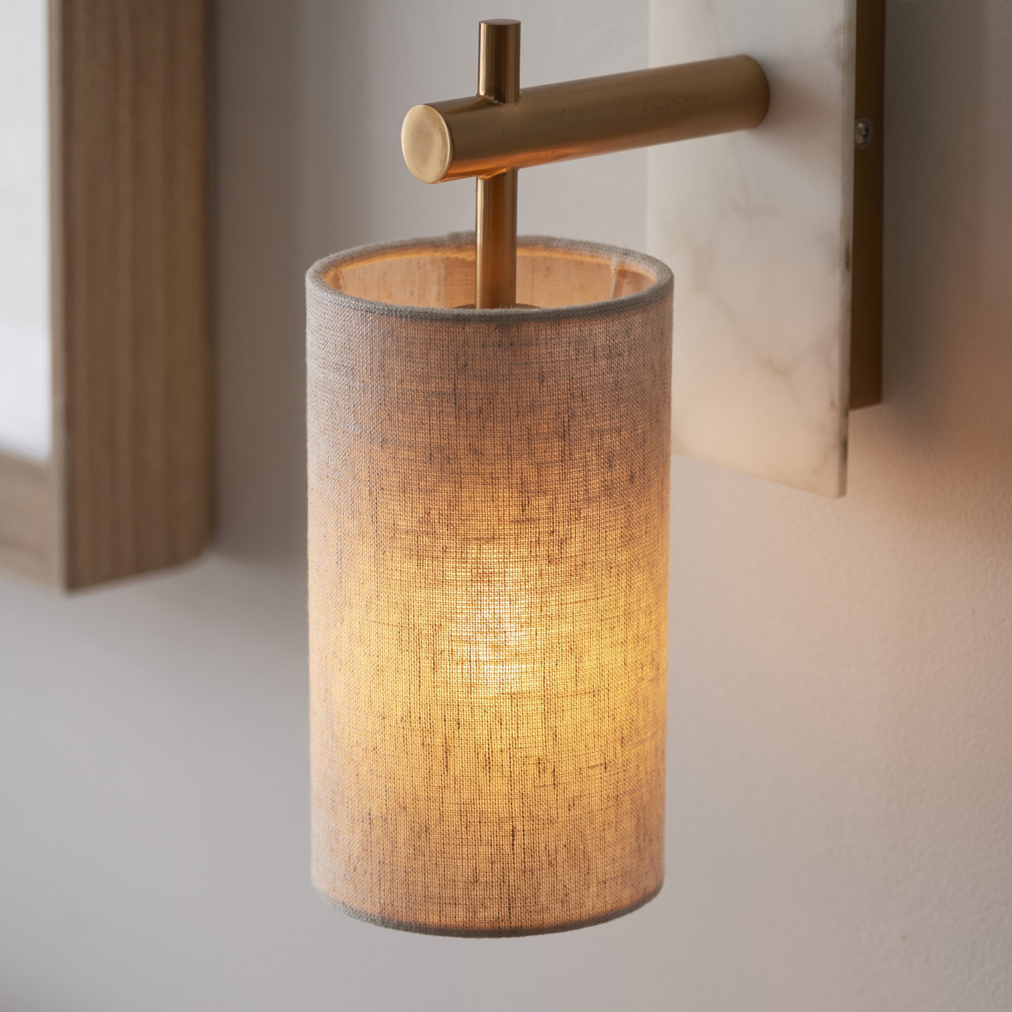 Utopia Spire Single White Marble Wall Light - Vintage Brass & Natural Cylindrical Shade