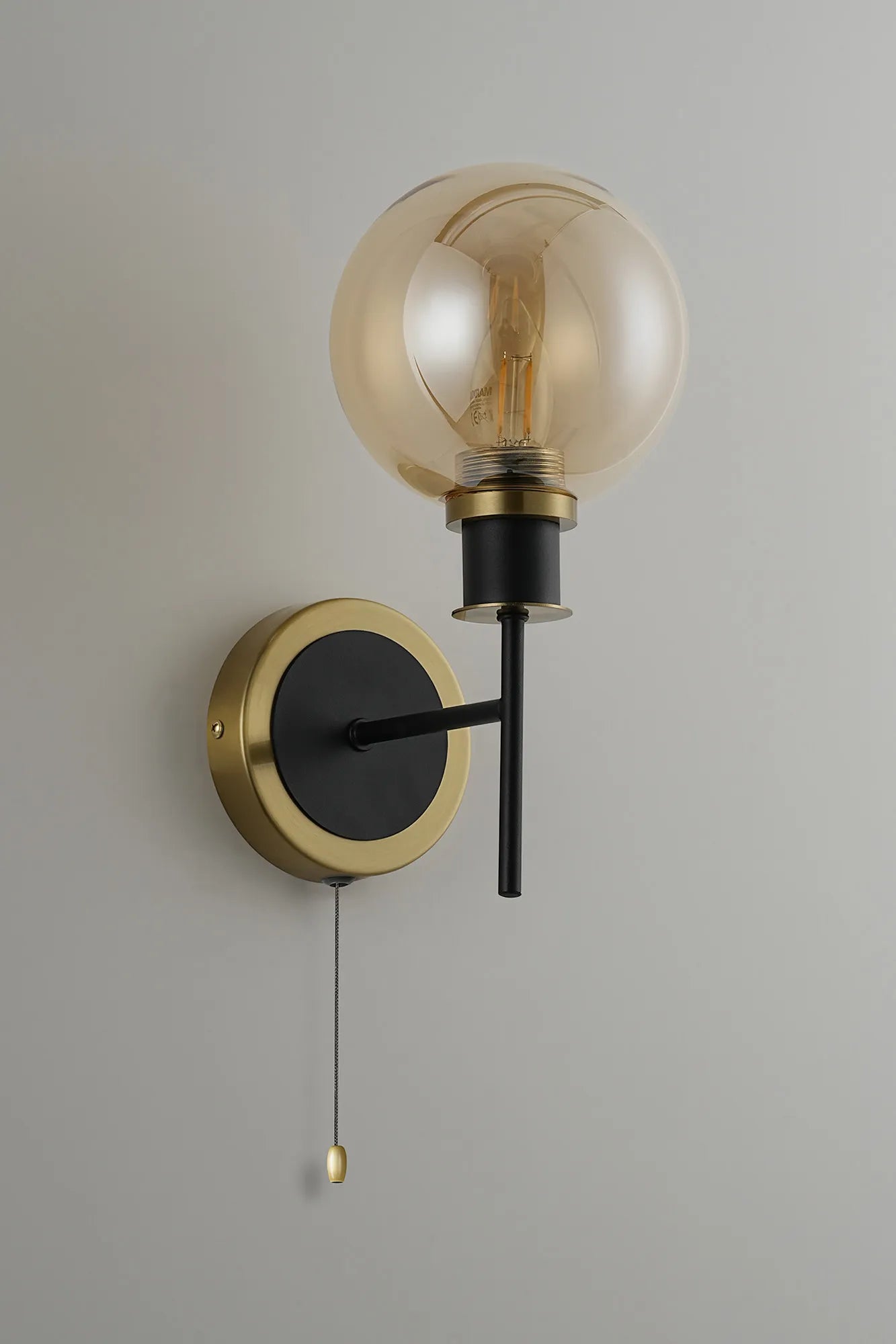 Sycamore Switched Wall Light with 15cm Round Glass Shade - Brass, Amber Plated & Satin Black