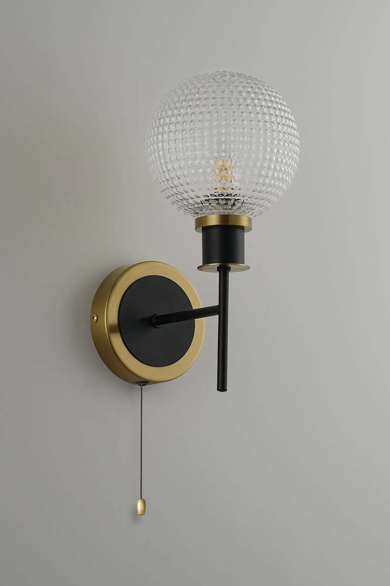 Sycamore Switched Wall Light with 15cm Round Textured Diamond Pattern Glass Shade - Brass, Clear & Satin Black