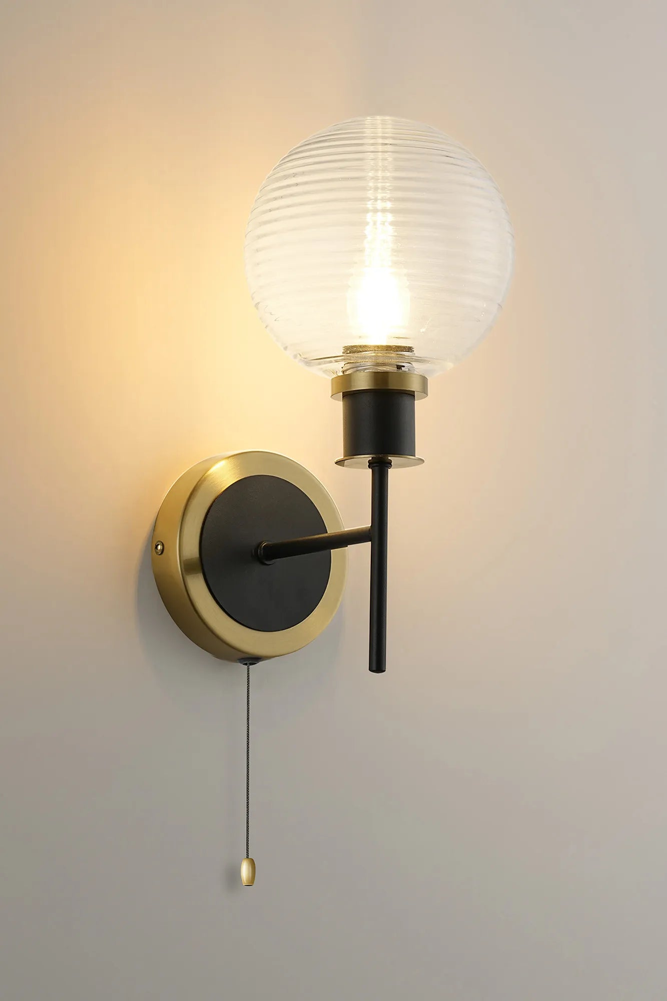 Sycamore Switched Wall Light with 15cm Round Ribbed Glass Shade - Brass, Clear & Satin Black