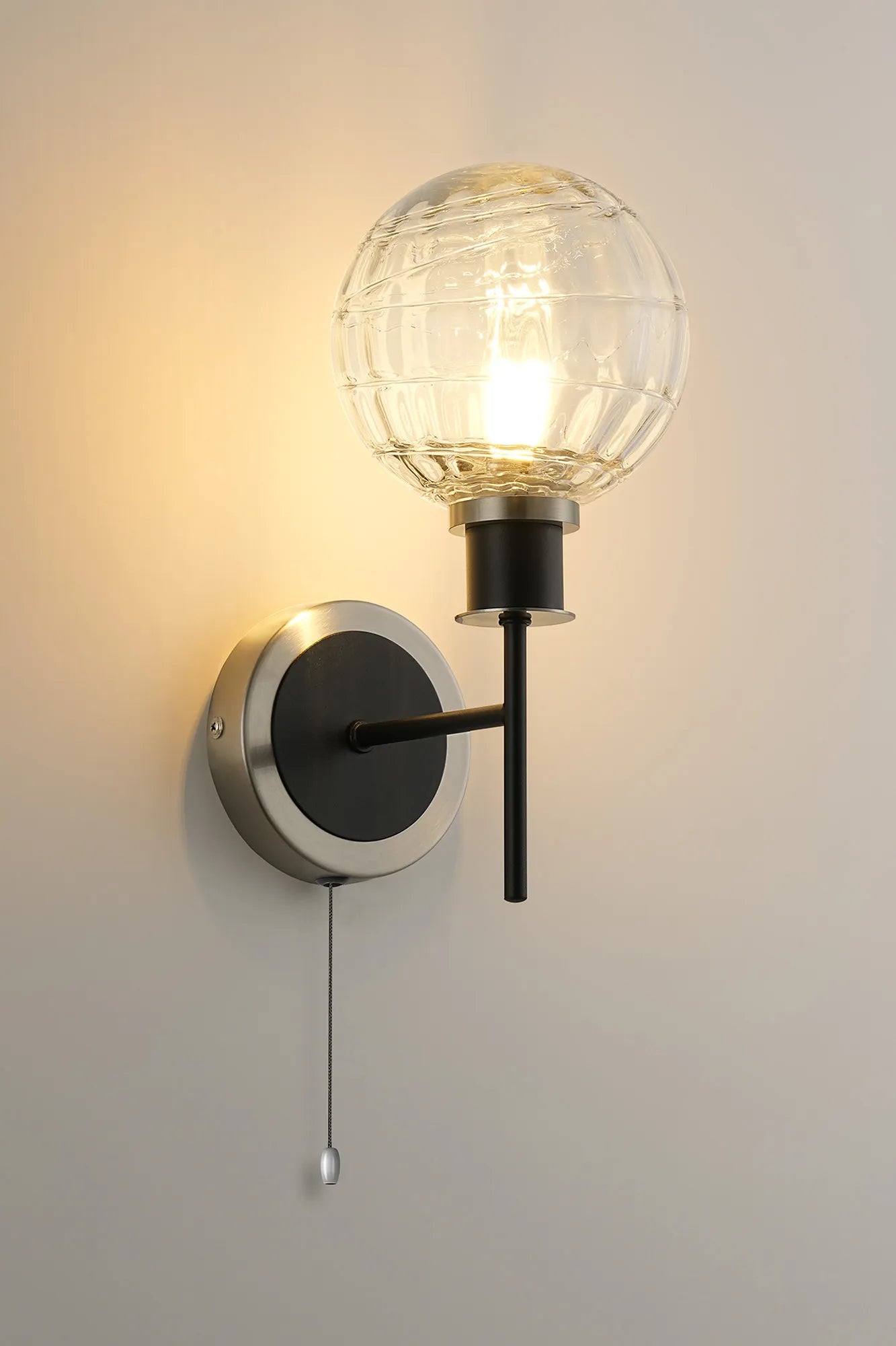 Sycamore Switched Wall Light with 15cm Round Textured Melting Glass Shade - Satin Nickel, Clear & Satin Black