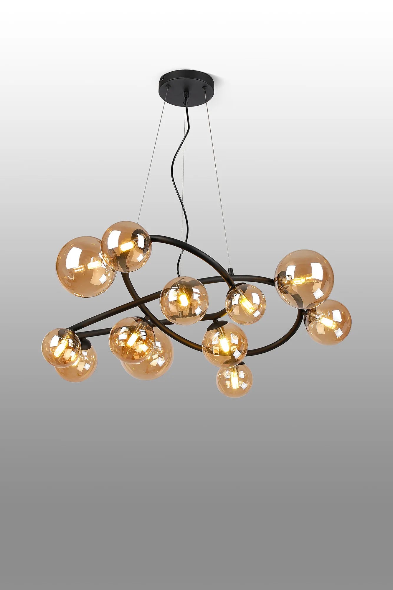 Deacon Twisted Pendant 12 Light - Satin Black Amber Plated Glass