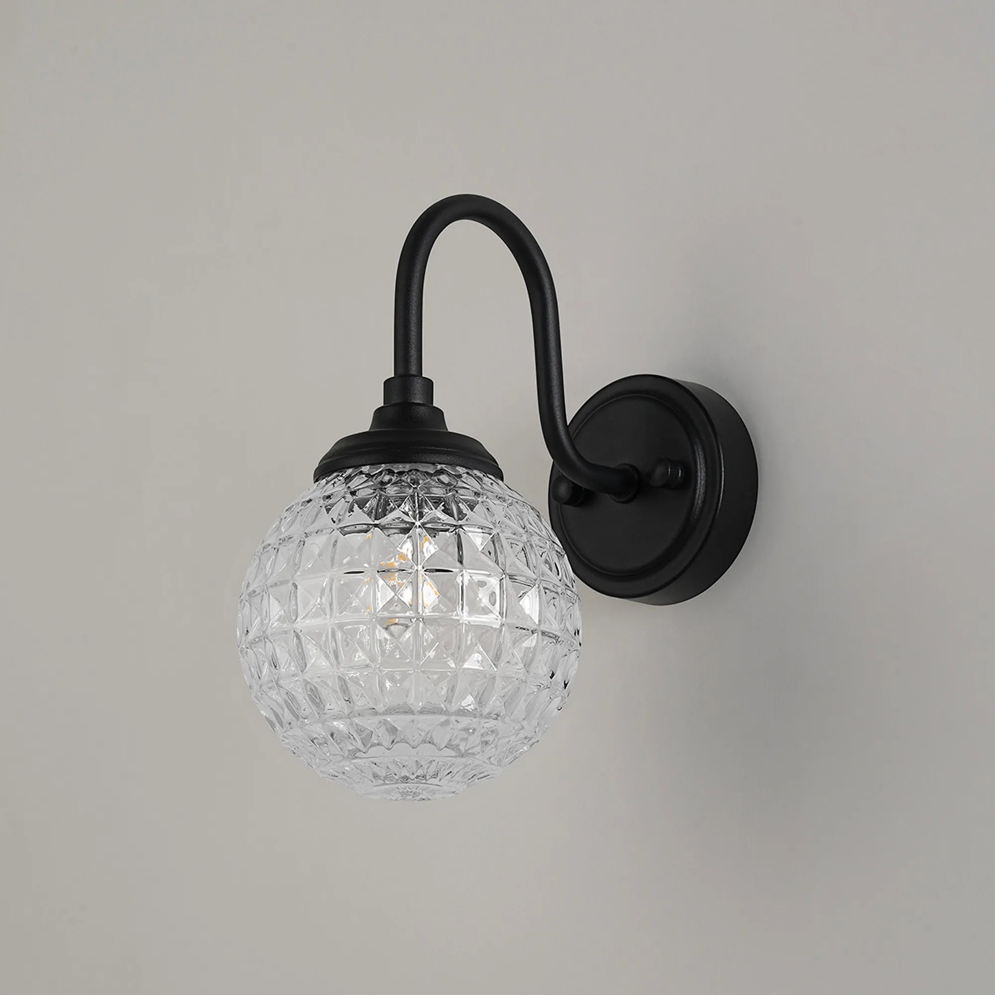 Dene Curved Arm Wall Light - 1 Light - IP44 Satin Black & Clear Cross Pattern Round Glass