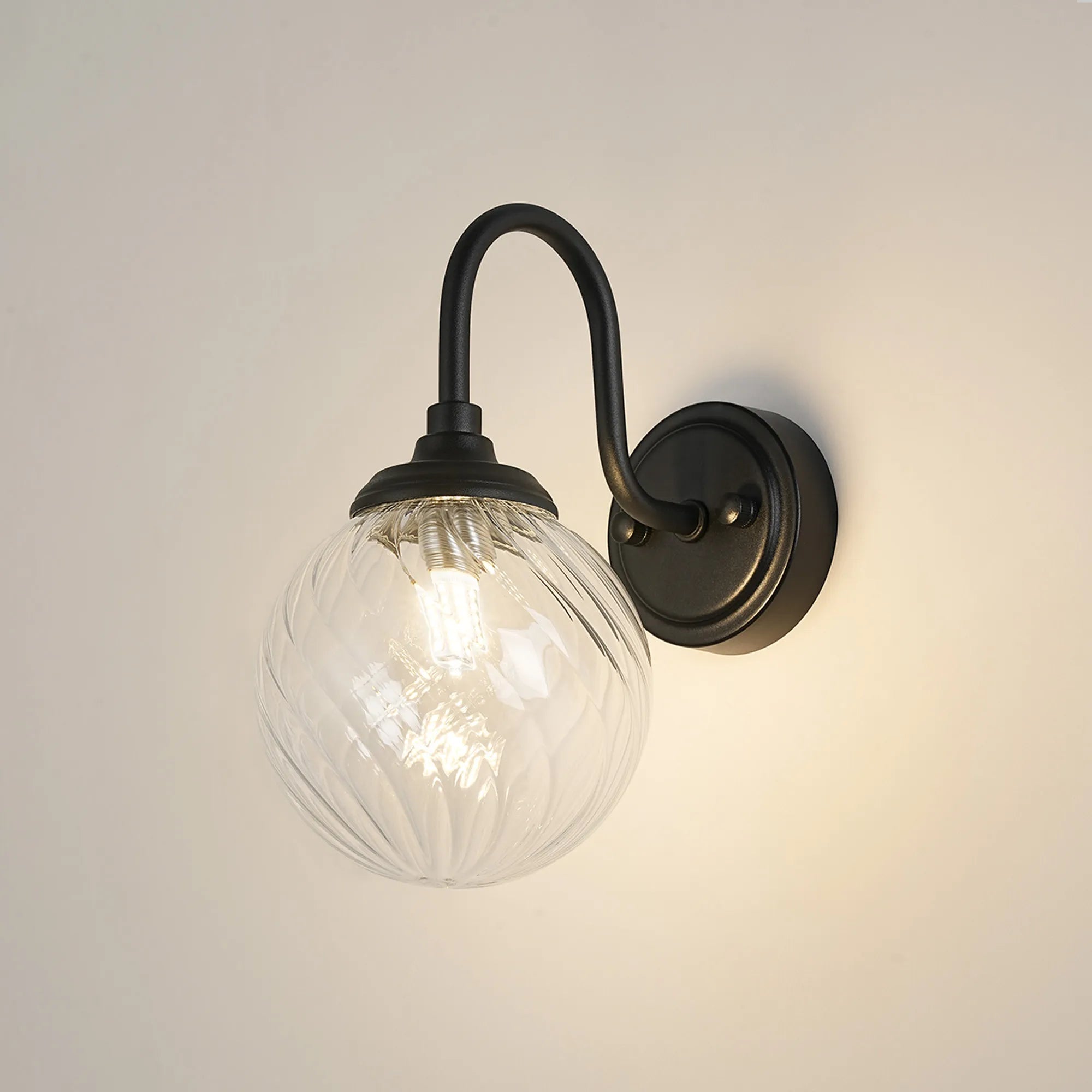 Dene Curved Arm Wall Light - 1 Light - IP44 Satin Black & Clear Swirl Round Glass