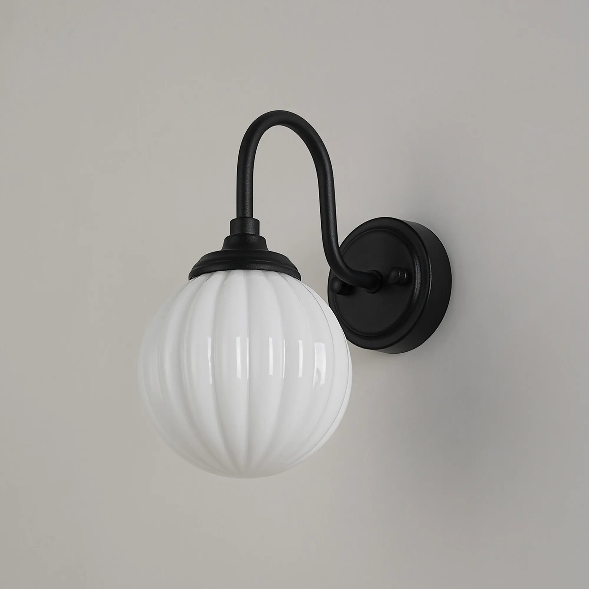 Dene Curved Arm Wall Light - 1 Light - IP44 Satin Black & Opal Round Segment Glass