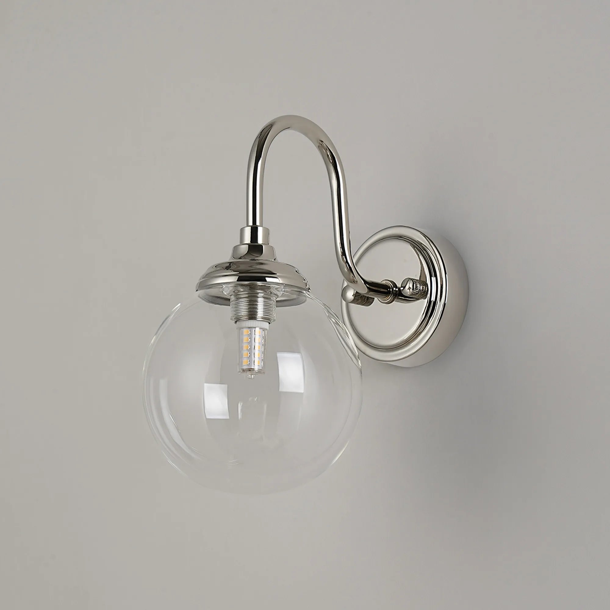 Dene Curved Arm Wall Light - 1 Light - IP44 Polished Nickel & Clear Smooth Round Glass