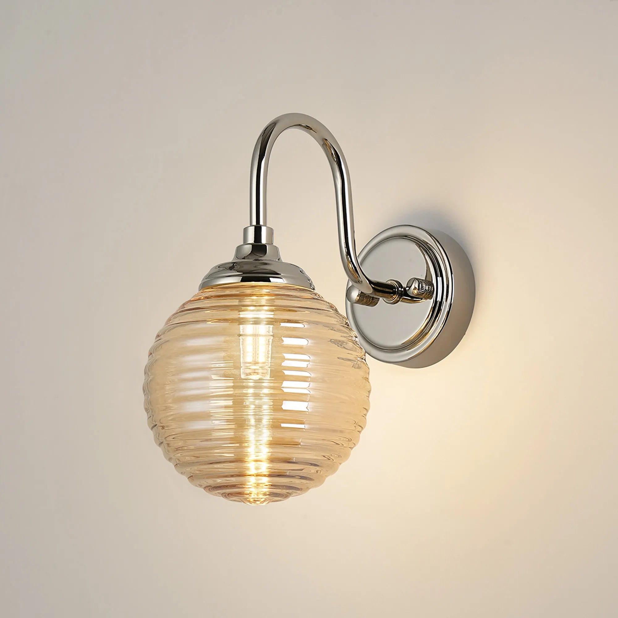 Dene Curved Arm Wall Light - 1 Light - IP44 Polished Nickel & Amber Ribbed Round Glass