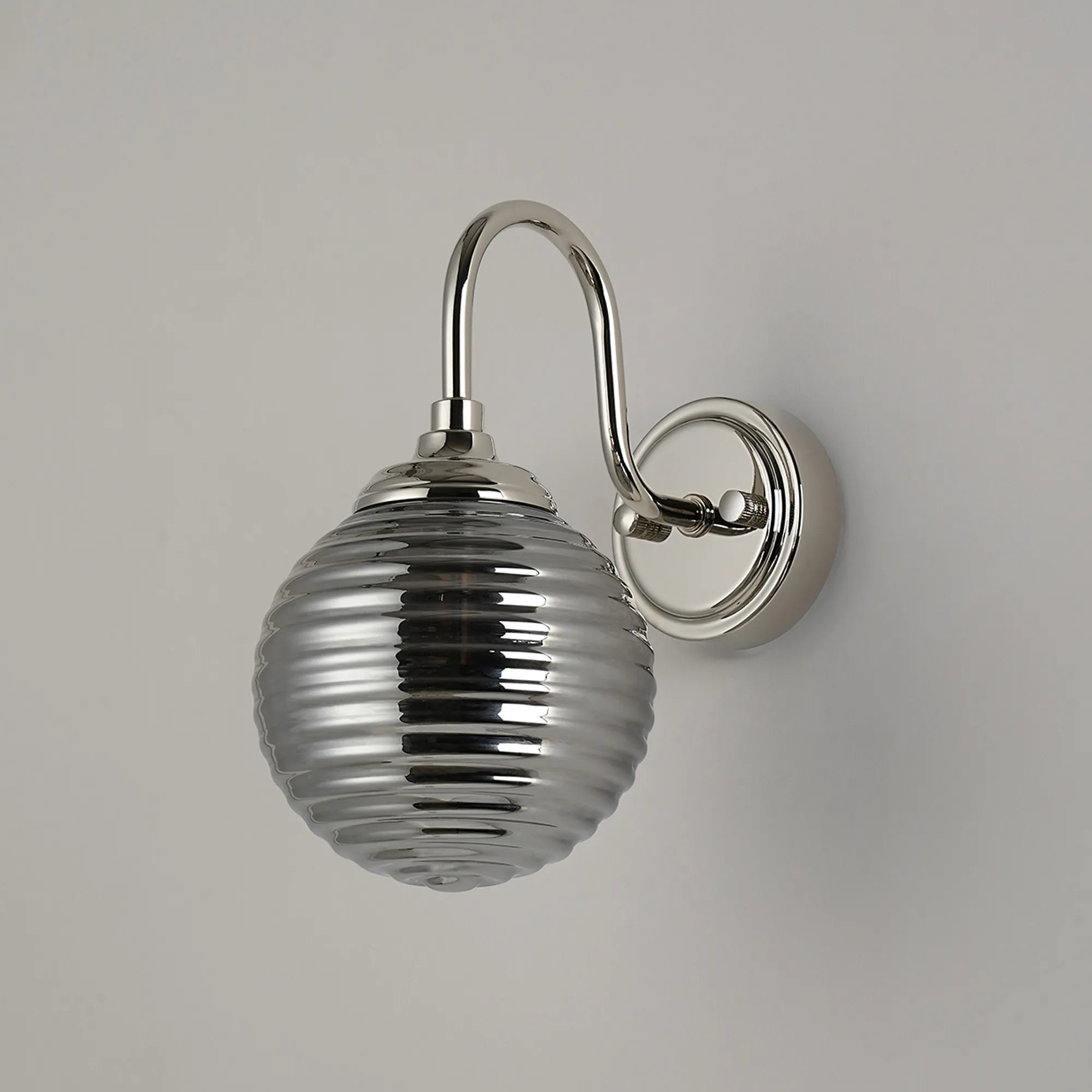 Dene Curved Arm Wall Light - 1 Light - IP44 Polished Nickel & Smoke Ribbed Round Glass
