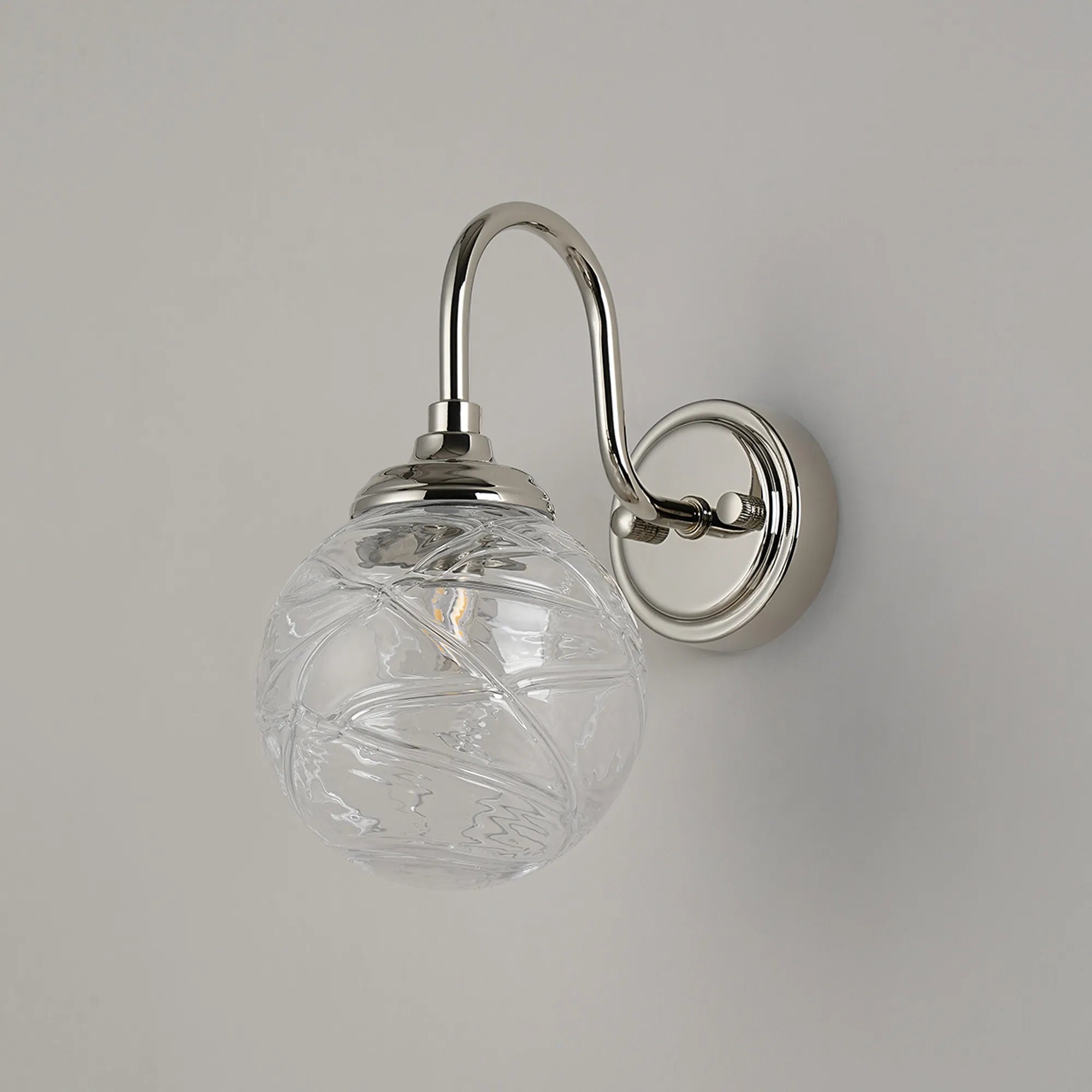 Dene Curved Arm Wall Light - 1 Light - IP44 Polished Nickel & Clear Dune Effect Round Glass