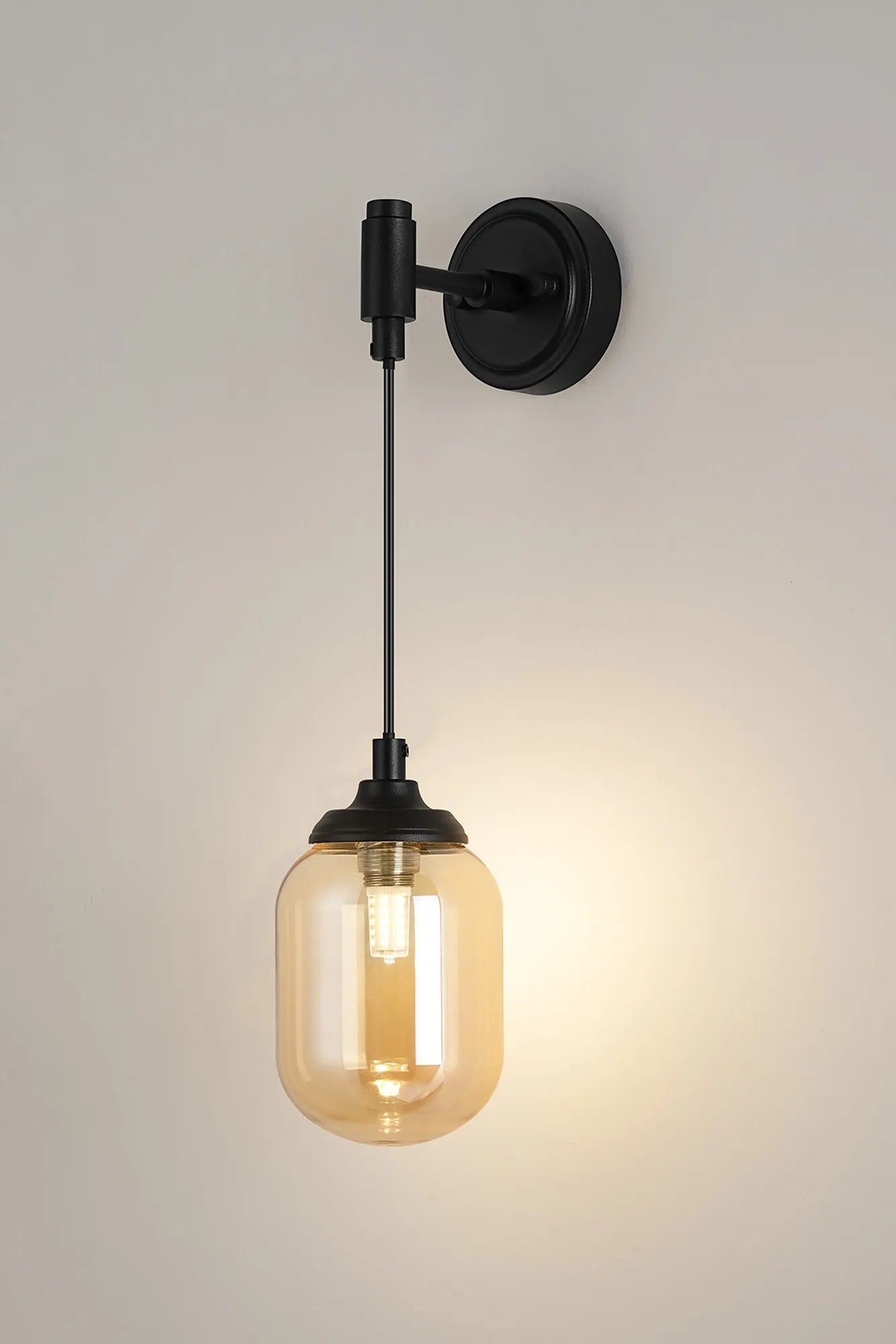 Dene Adjustable Single Wall Light IP44 - Satin Black & Amber Smooth Tubular Glass