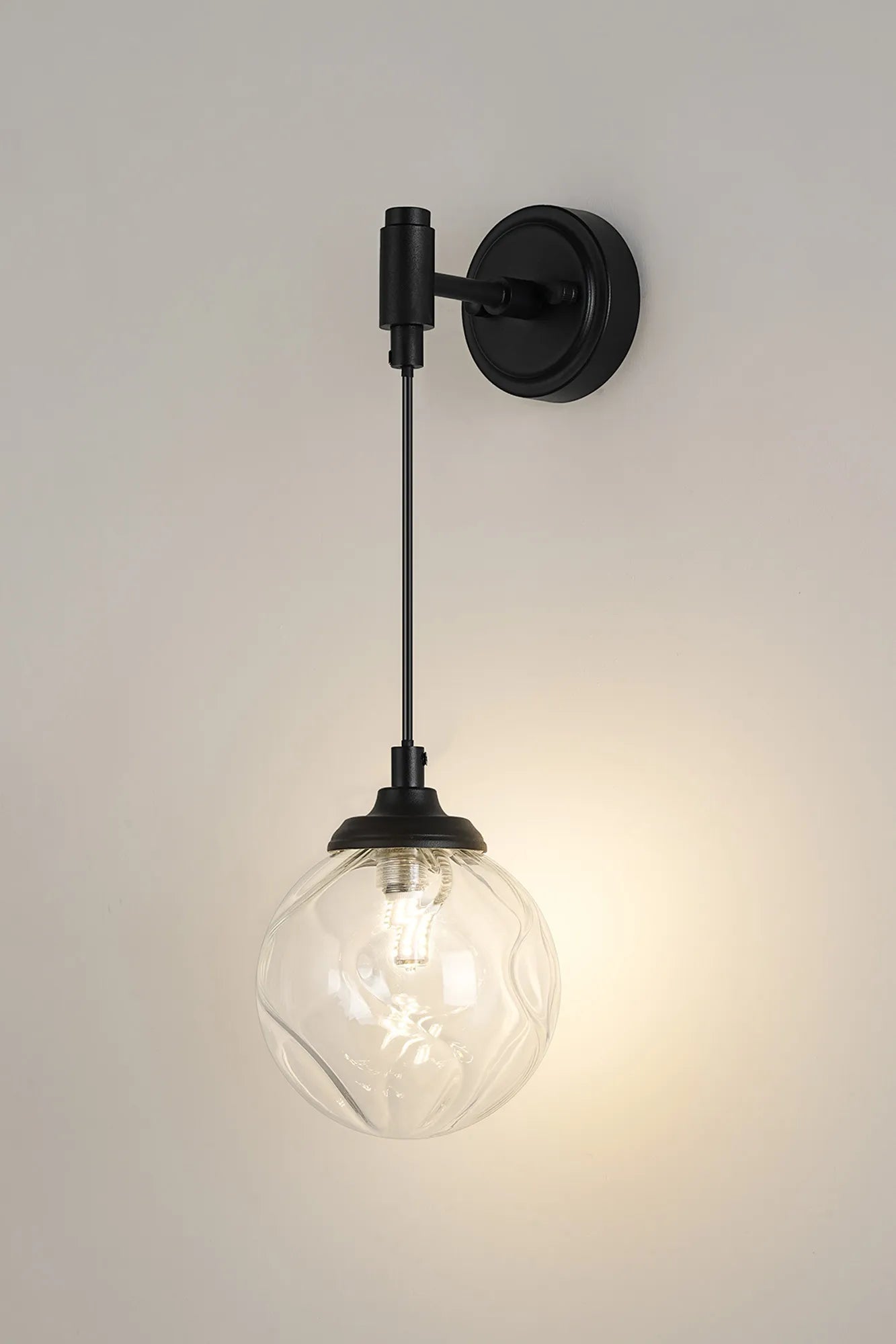 Dene Adjustable Single Wall Light IP44 - Satin Black & Clear Waved Round Glass
