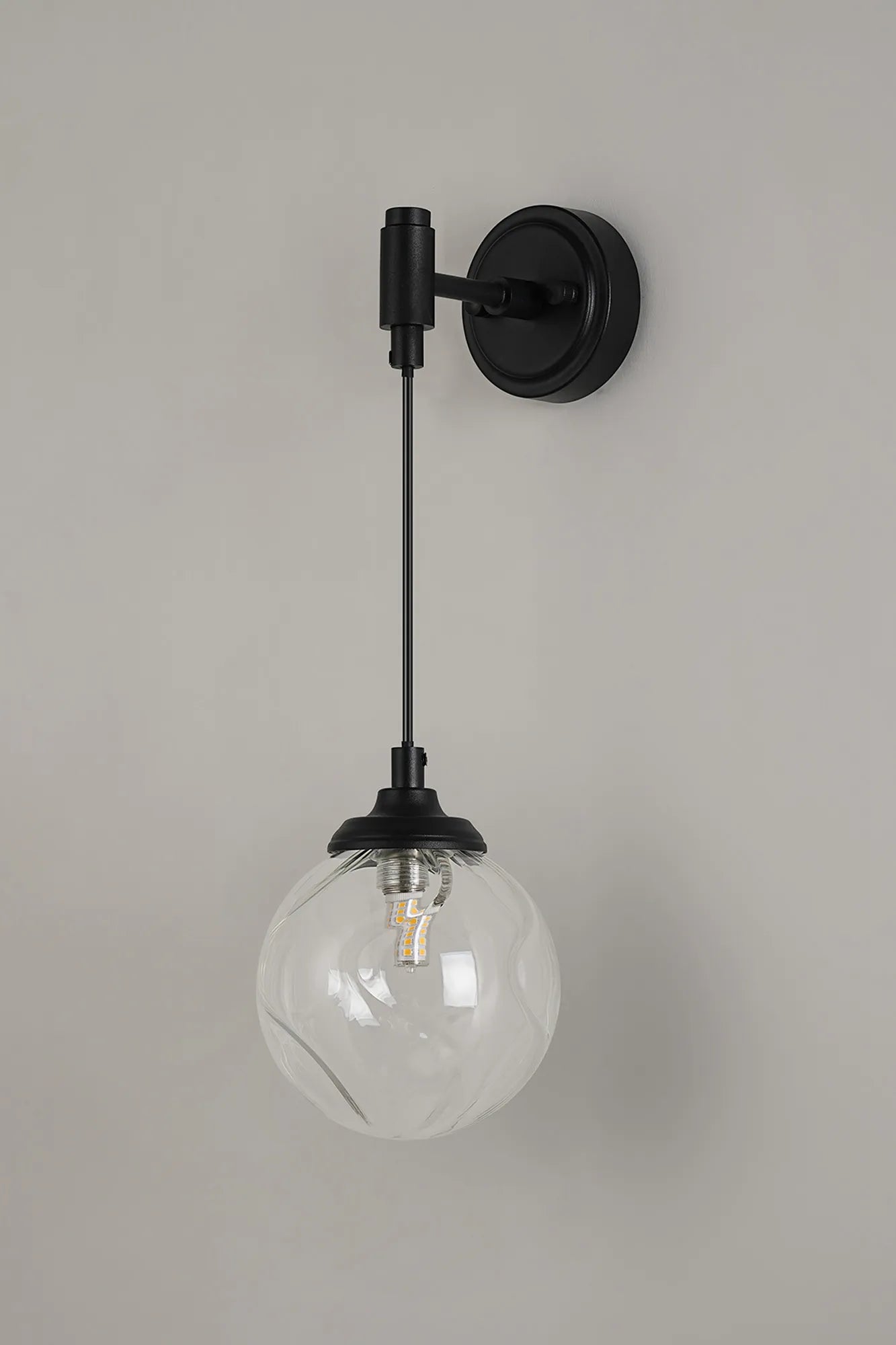 Dene Adjustable Single Wall Light IP44 - Satin Black & Clear Waved Round Glass