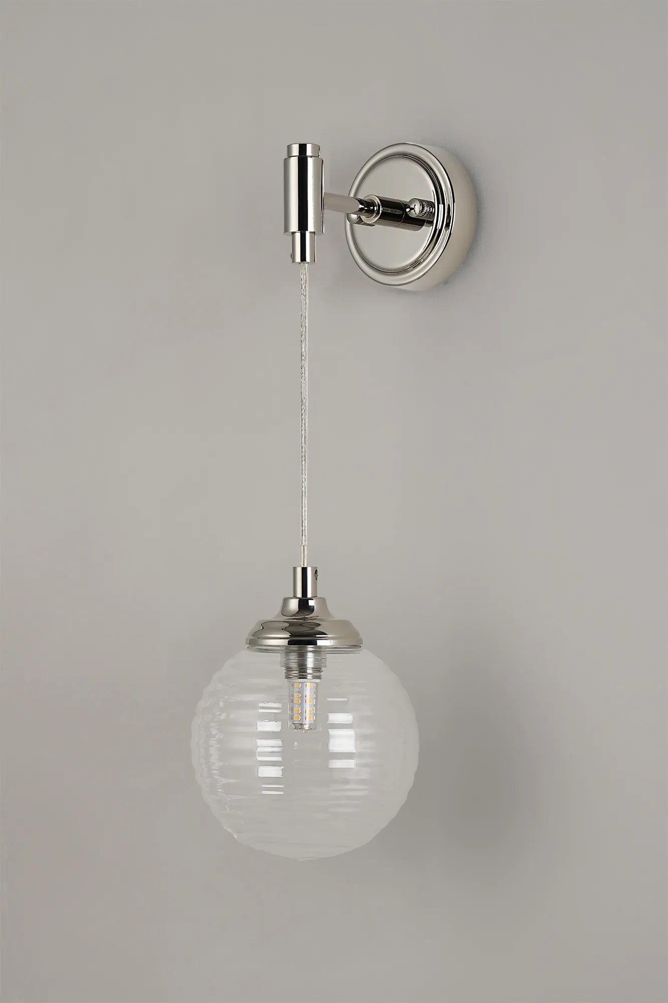 Dene Adjustable Single Wall Light IP44 - Polished Nickel & Clear Ribbed Round Glass