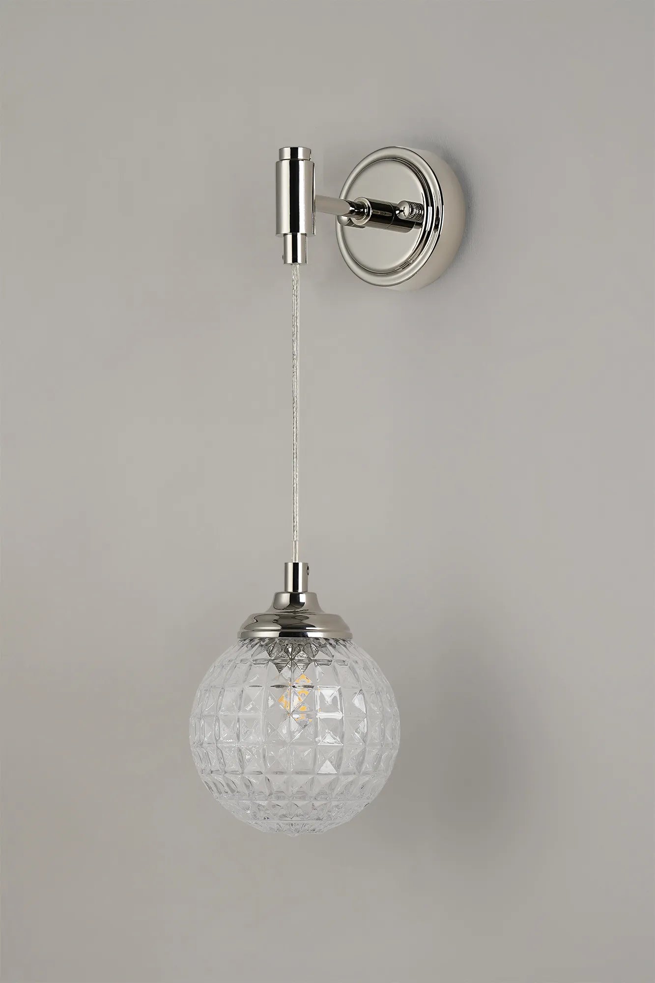 Dene Adjustable Single Wall Light IP44 - Polished Nickel & Clear Cross Pattern Round Glass