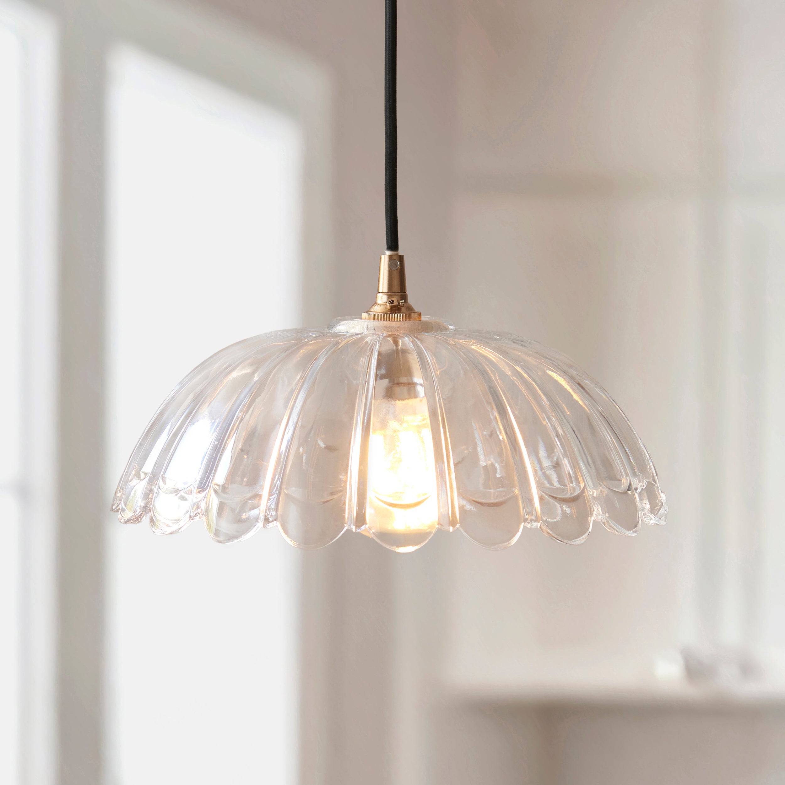 Endon Eltham & Carnation Pendant - Clear Glass & Brushed Aged Brass With Black Braided Cable
