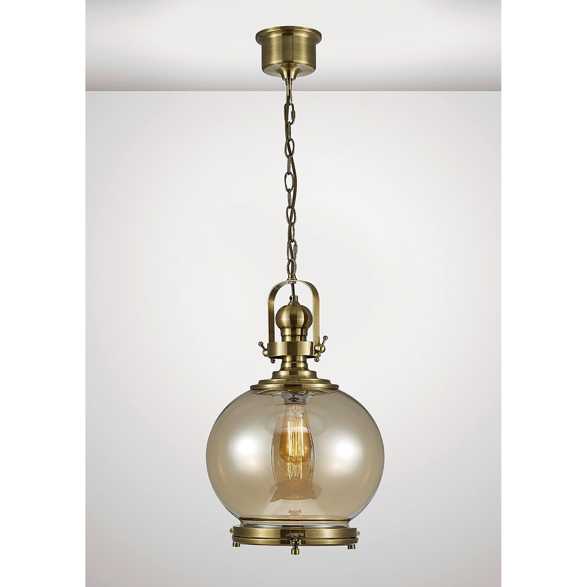 Diyas IL31597 Riley Single Medium Ball Pendant 1 Light E27 Antique Brass/Cognac Glass