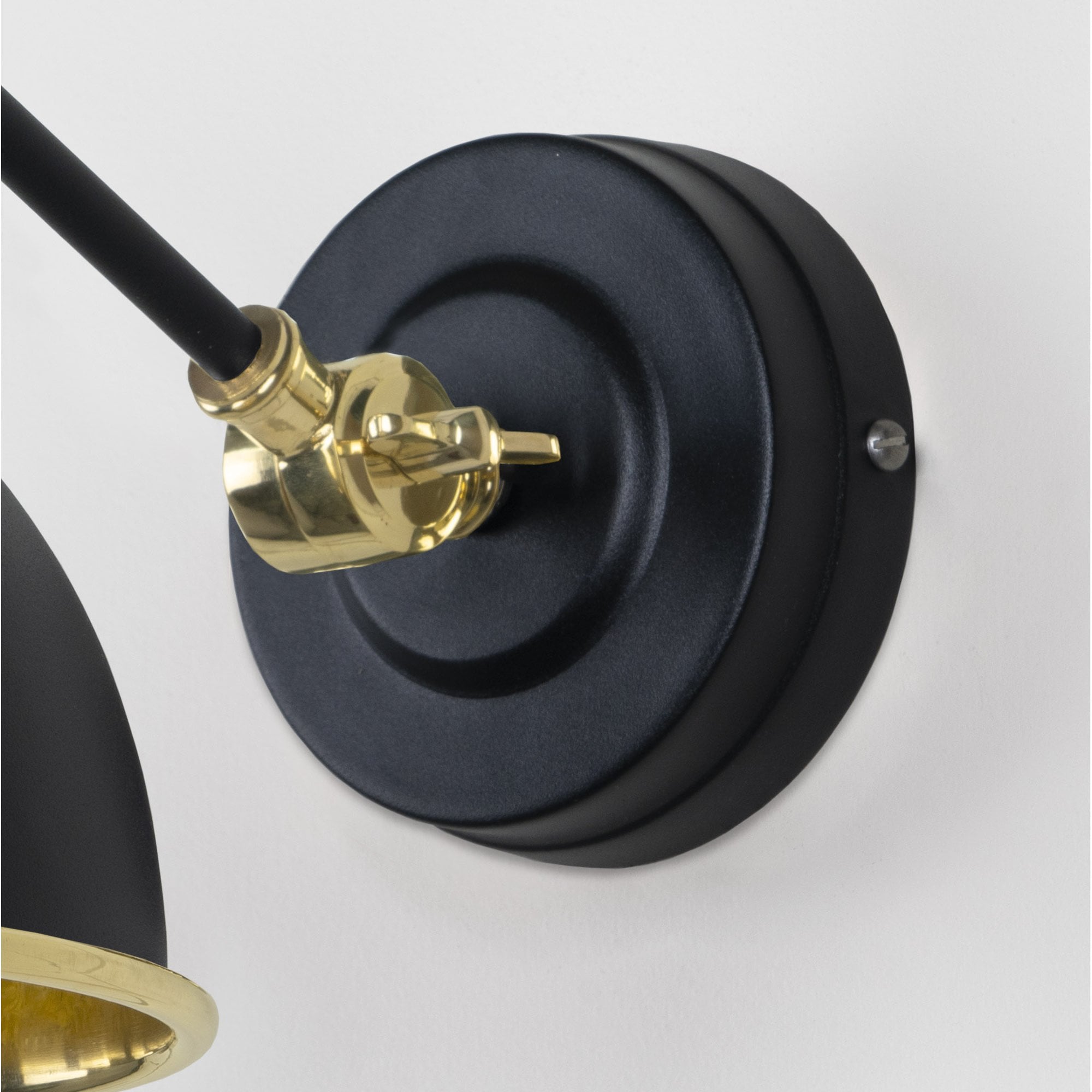 From The Anvil Smooth Brass Brindley Wall Light - Elan Black