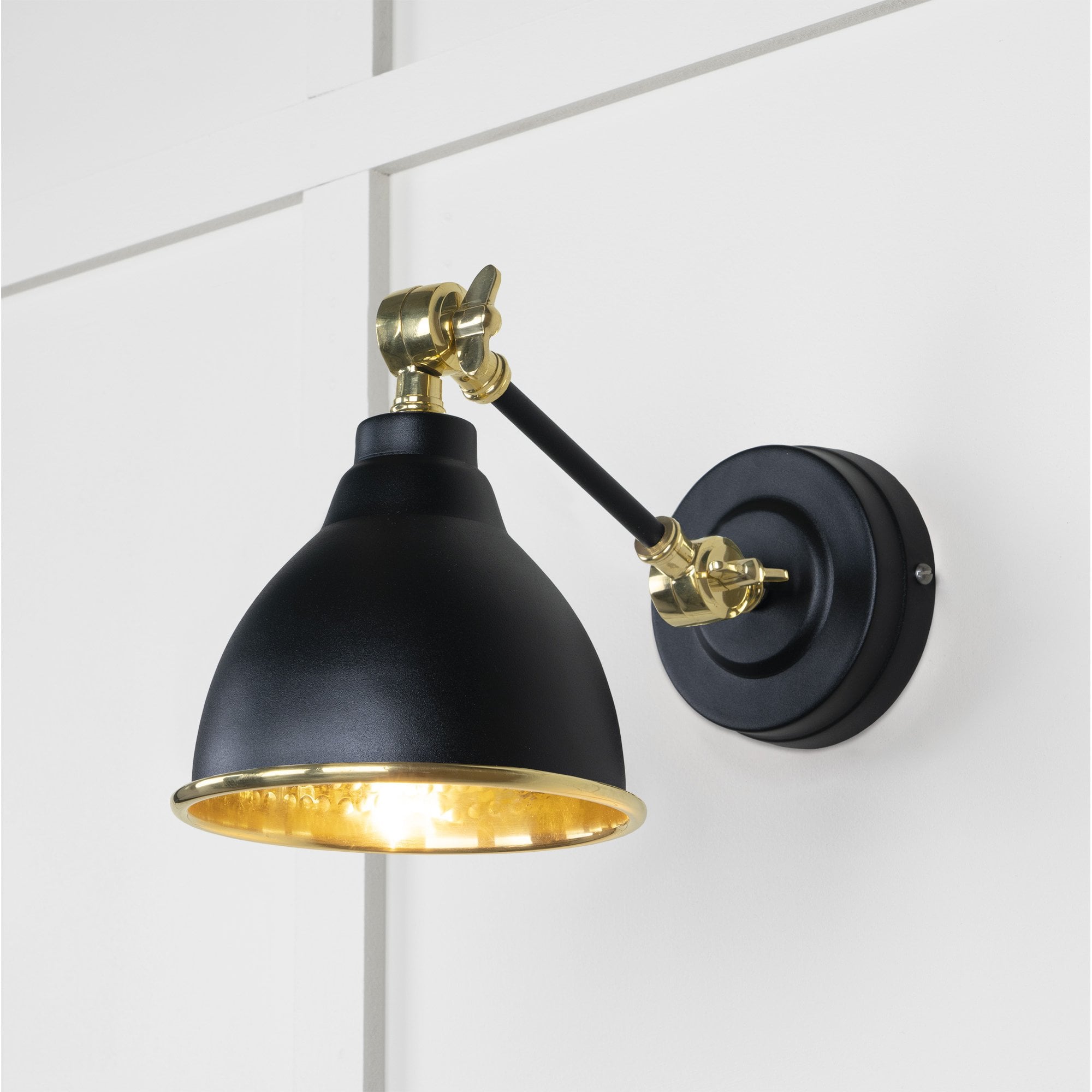 From The Anvil Hammered Brass Brindley Wall Light - Elan Black