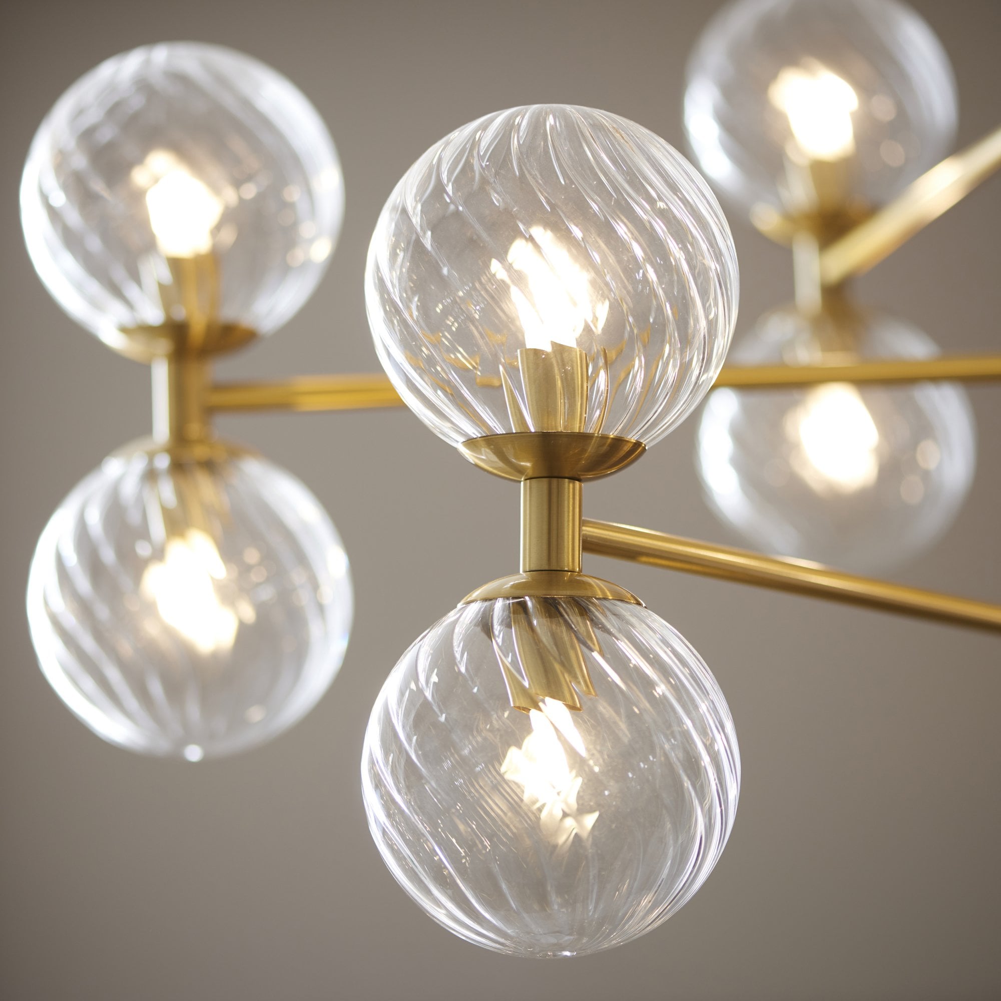 Utopia Atomic 12 Light Pendant - Brushed Aged Brass & Twisted Clear Glass