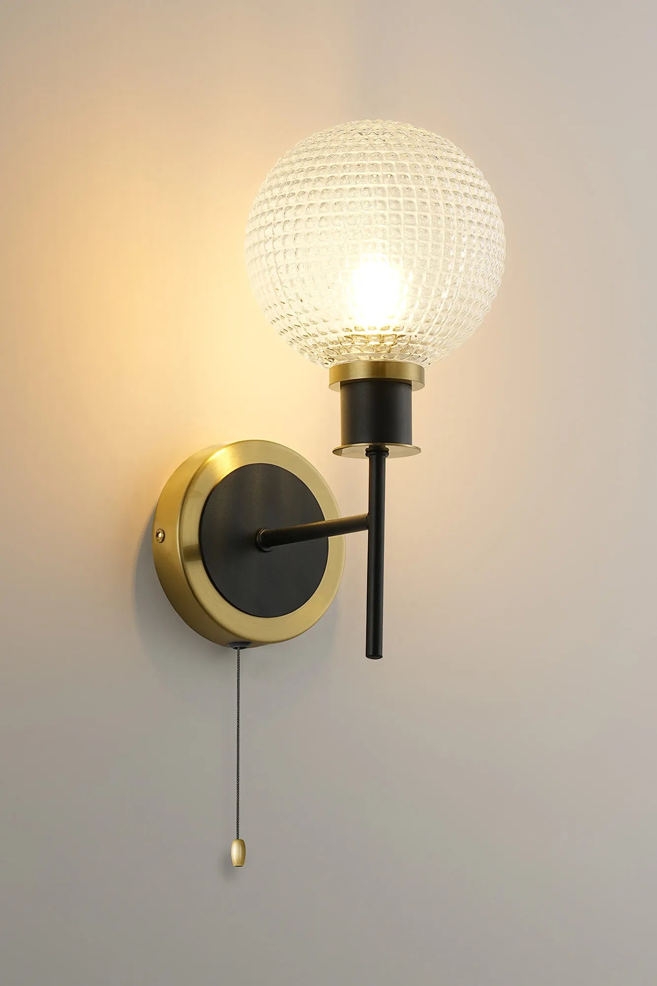 Sycamore Switched Wall Light with 15cm Round Textured Diamond Pattern Glass Shade - Brass, Clear & Satin Black