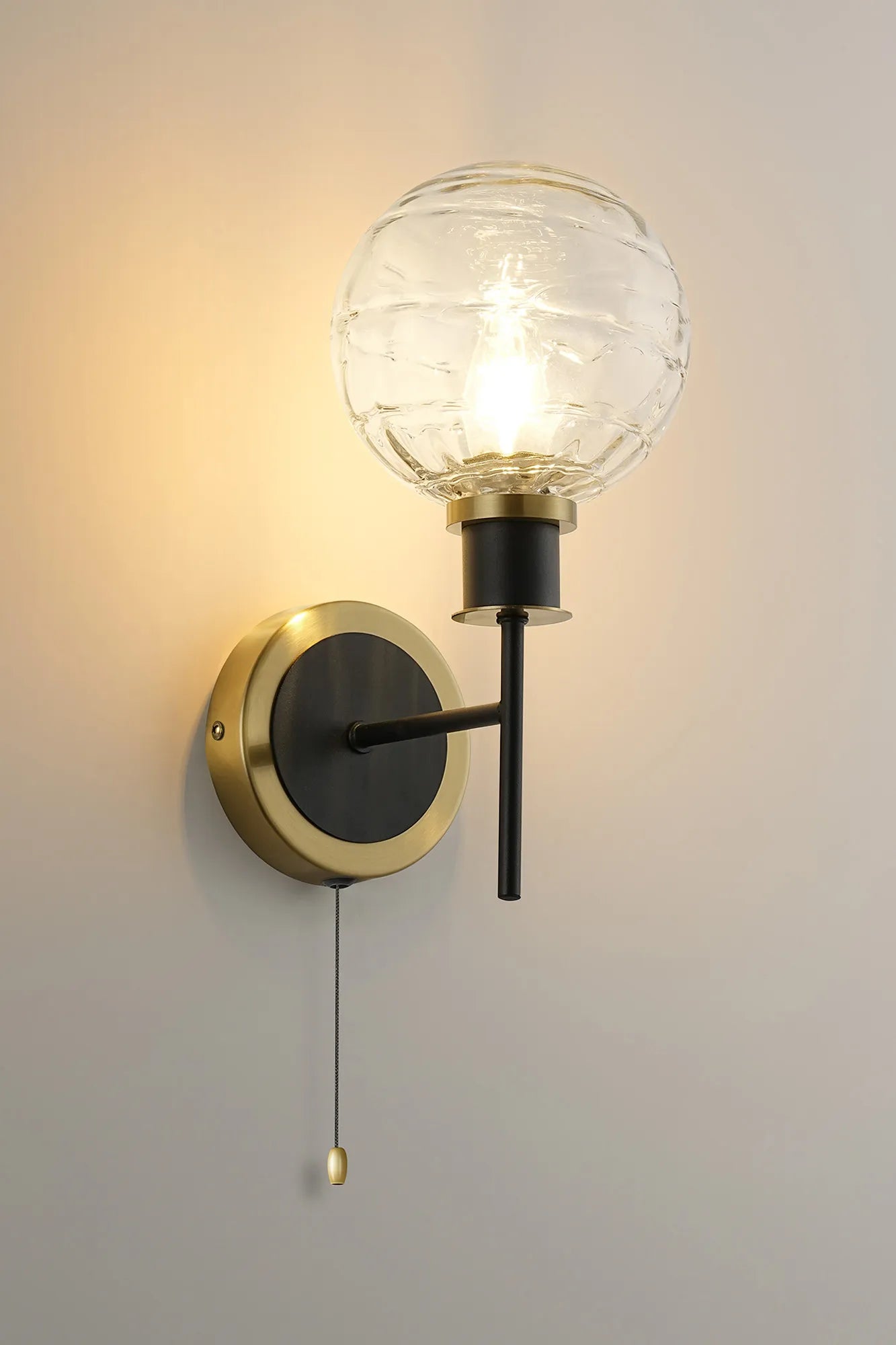 Sycamore Switched Wall Light with 15cm Round Textured Melting Glass Shade - Brass, Clear & Satin Black