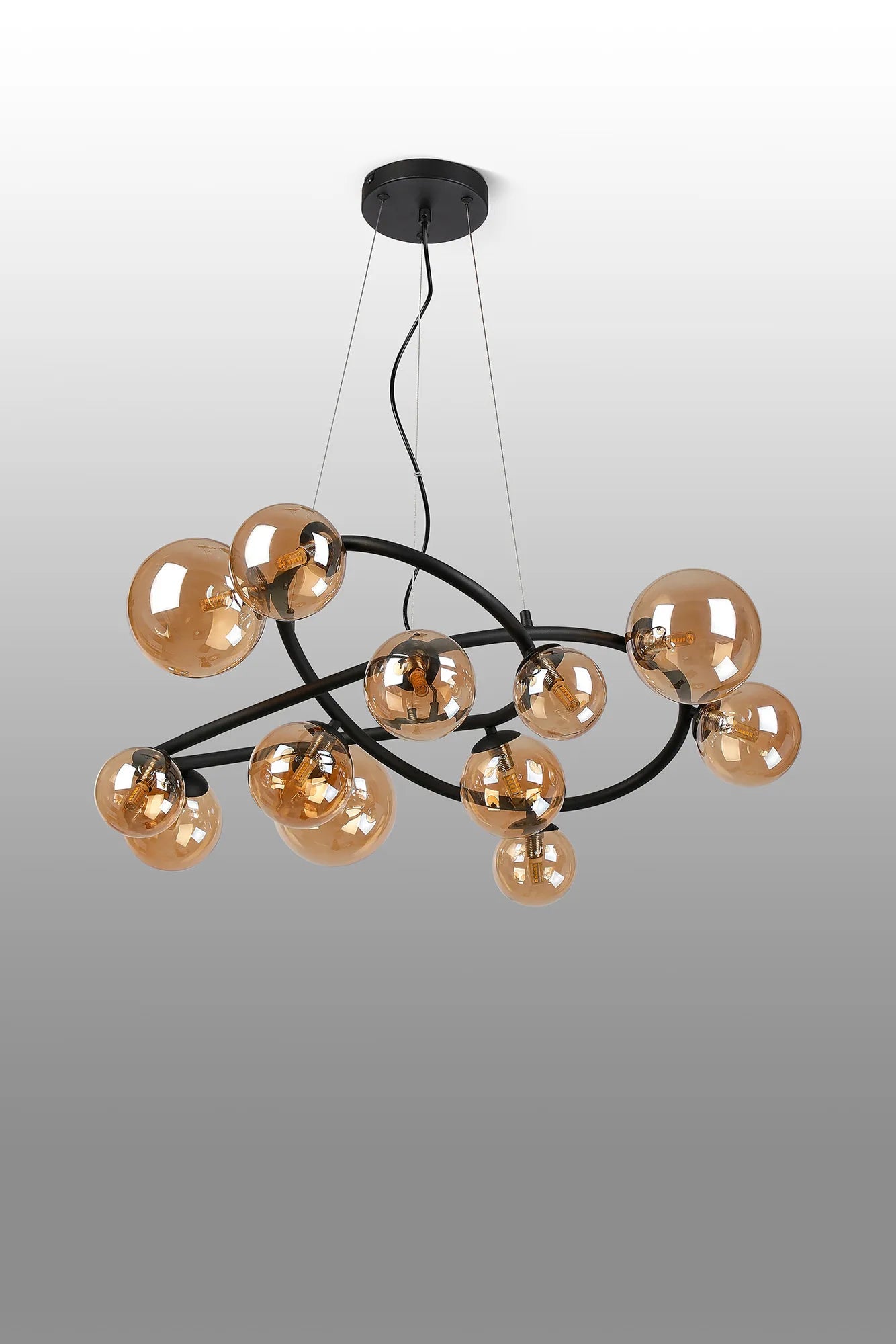 Deacon Twisted Pendant 12 Light - Satin Black Amber Plated Glass