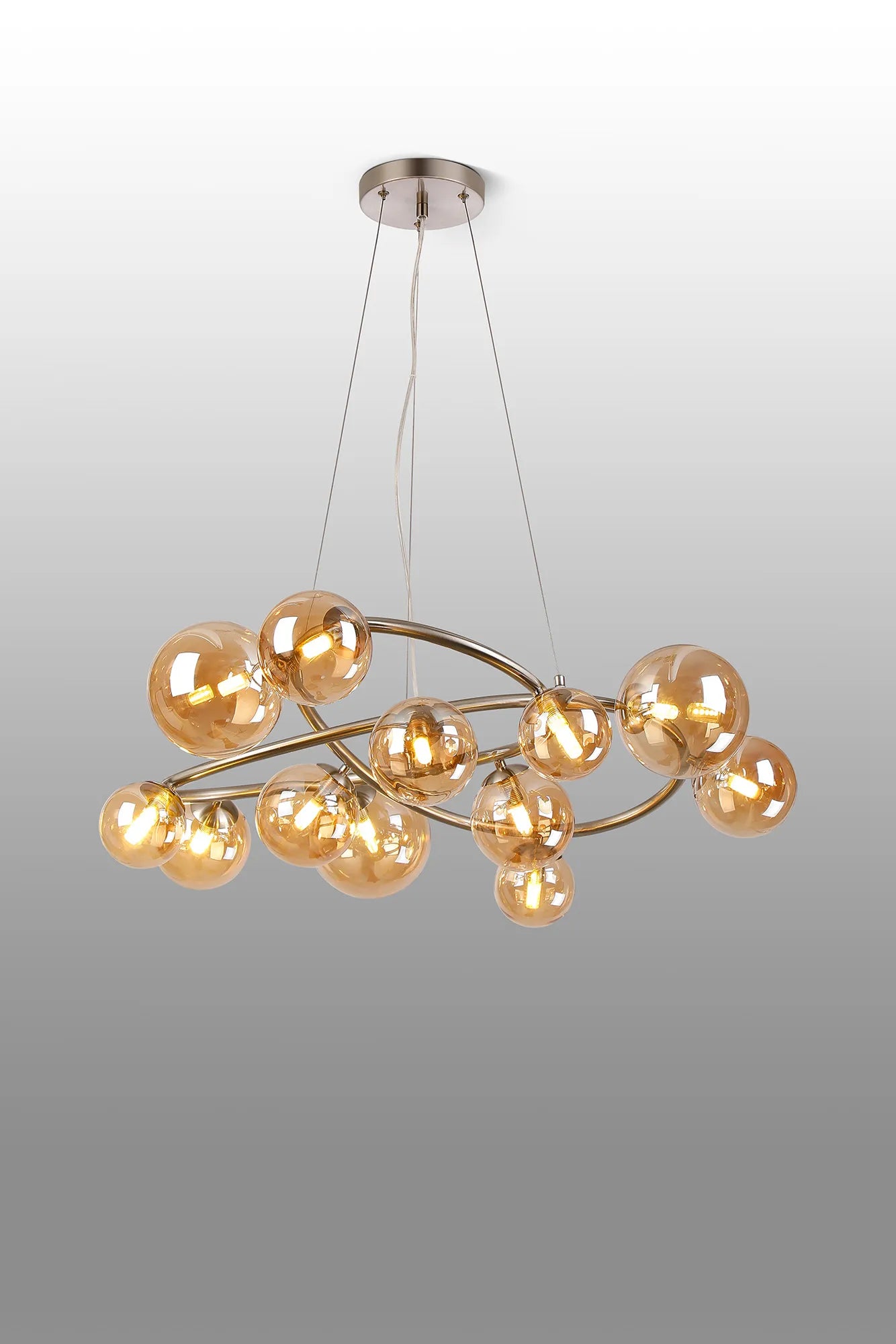 Deacon Twisted Pendant 12 Light - Satin Nickel Amber Plated Glass