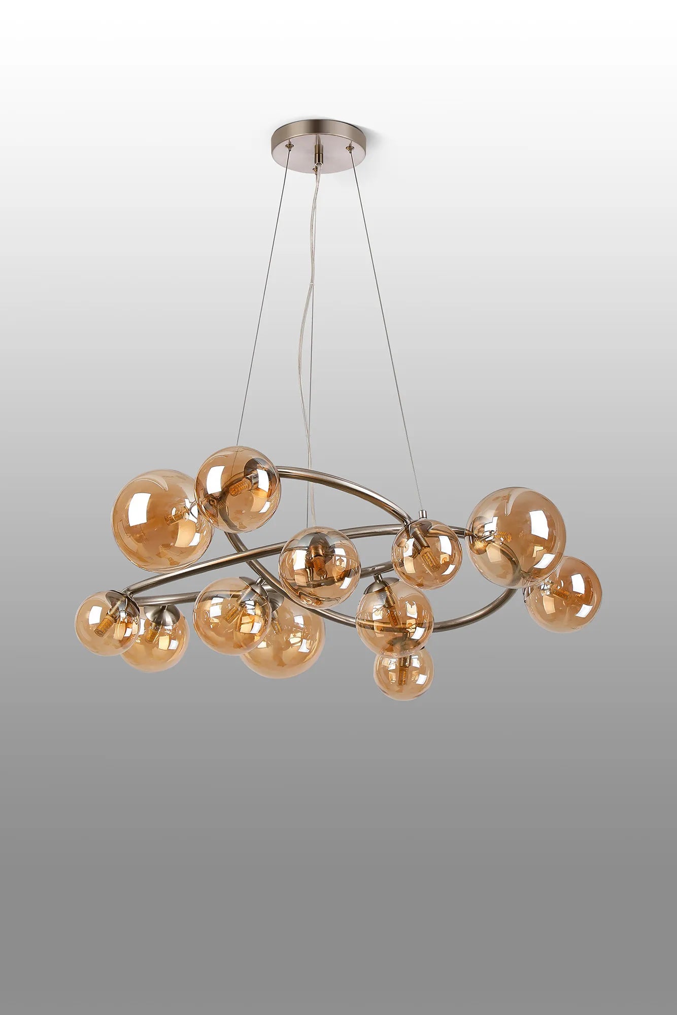 Deacon Twisted Pendant 12 Light - Satin Nickel Amber Plated Glass