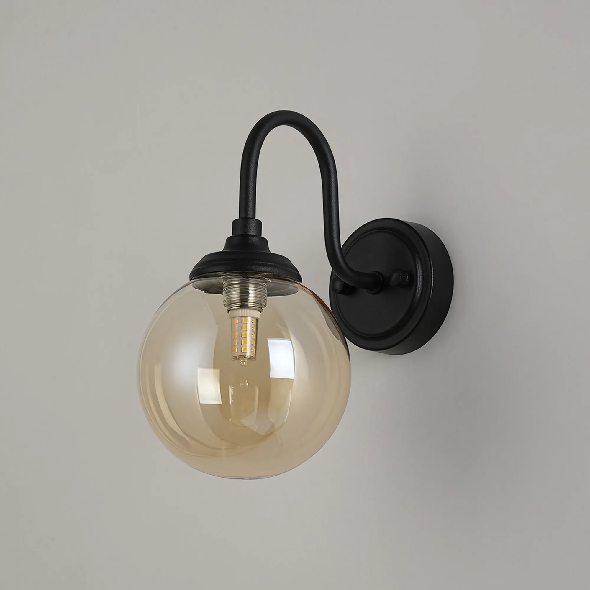 Dene Curved Arm Wall Light - 1 Light - IP44 Satin Black & Amber Smooth Round Glass