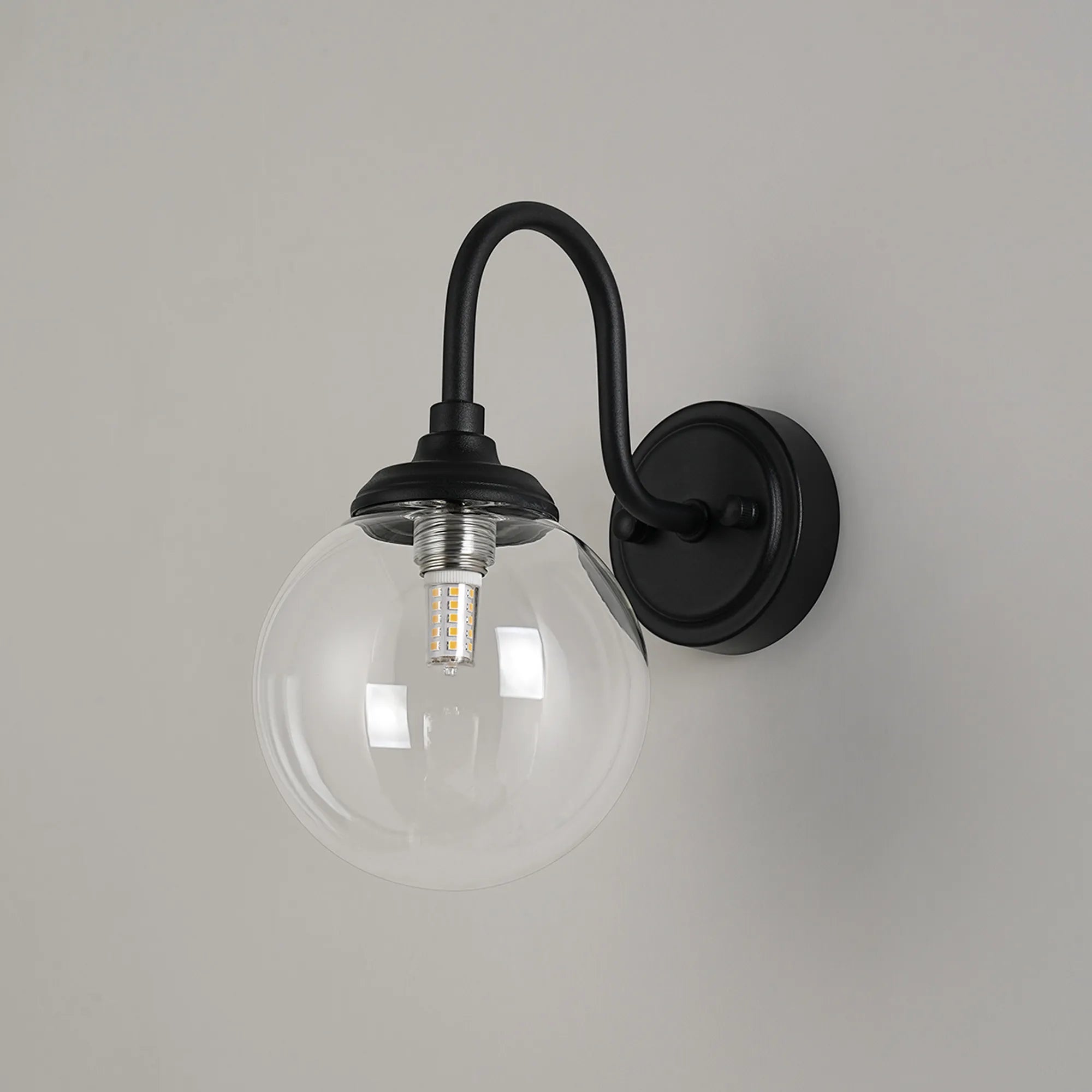 Dene Curved Arm Wall Light - 1 Light - IP44 Satin Black & Clear Smooth Round Glass