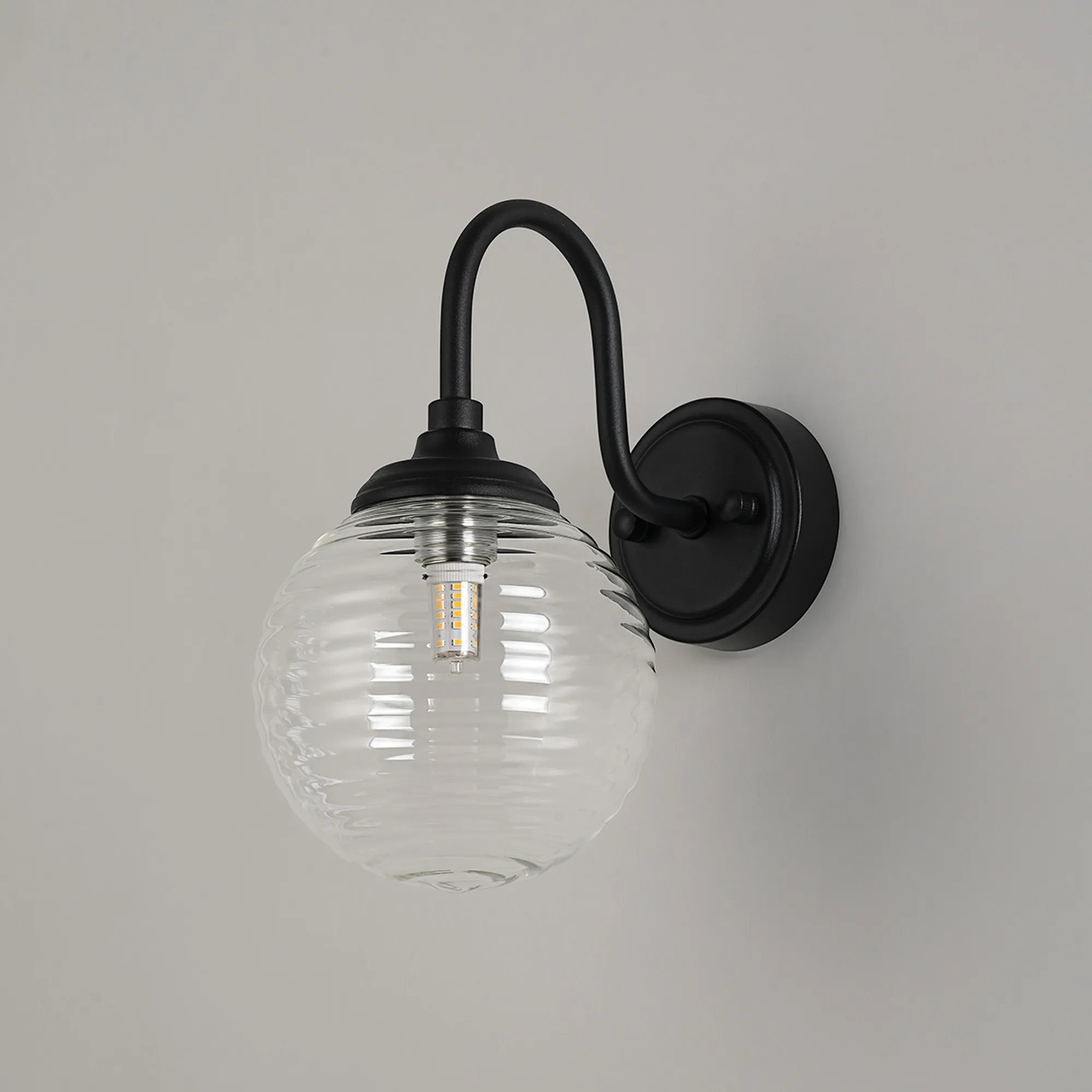Dene Curved Arm Wall Light - 1 Light - IP44 Satin Black & Clear Ribbed Round Glass