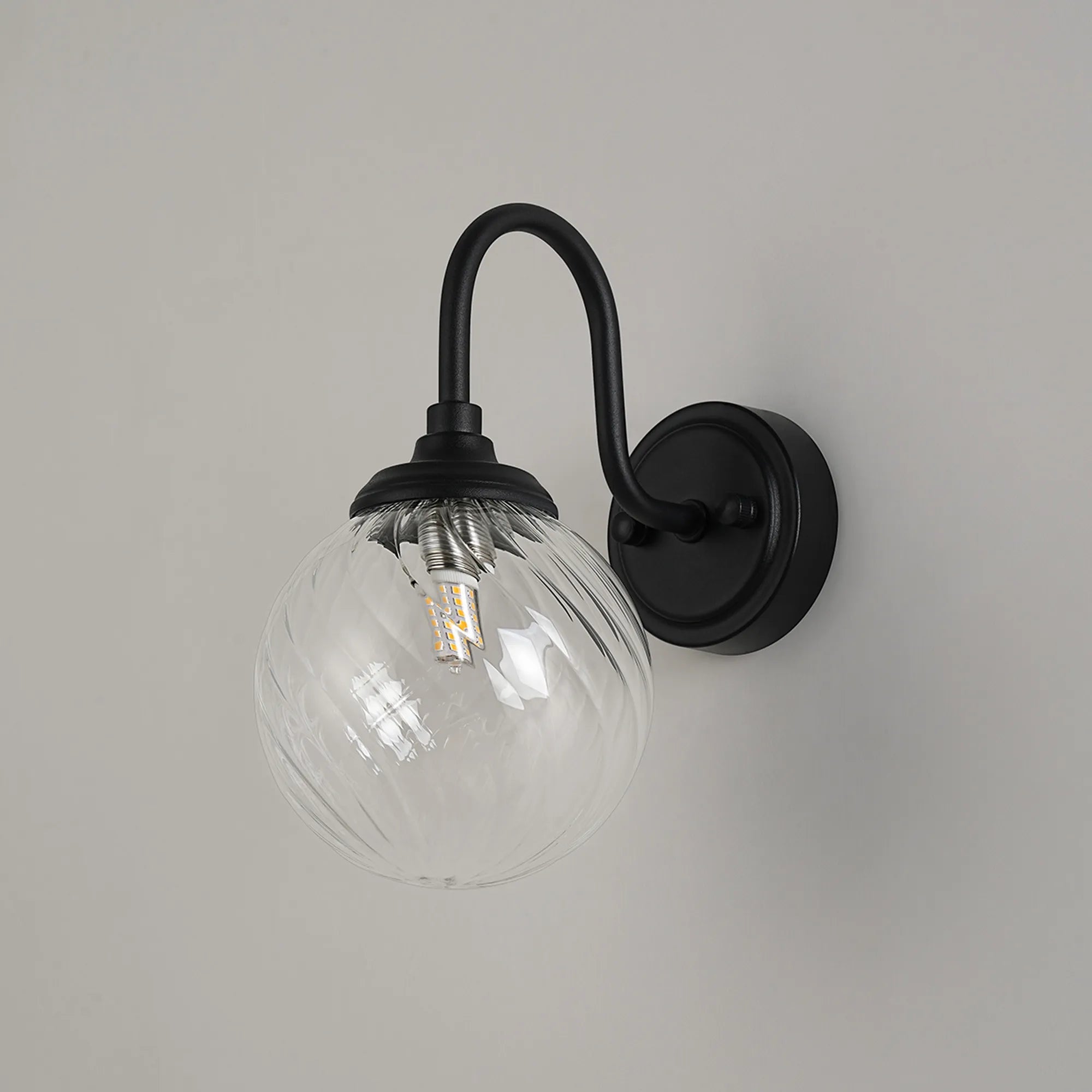 Dene Curved Arm Wall Light - 1 Light - IP44 Satin Black & Clear Swirl Round Glass