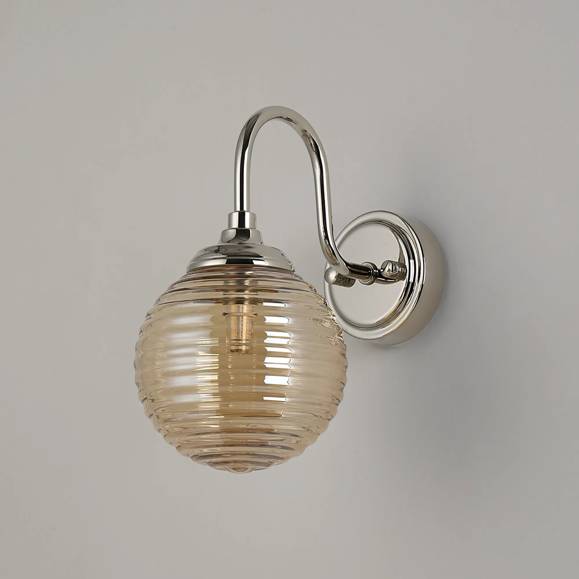 Dene Curved Arm Wall Light - 1 Light - IP44 Polished Nickel & Amber Ribbed Round Glass