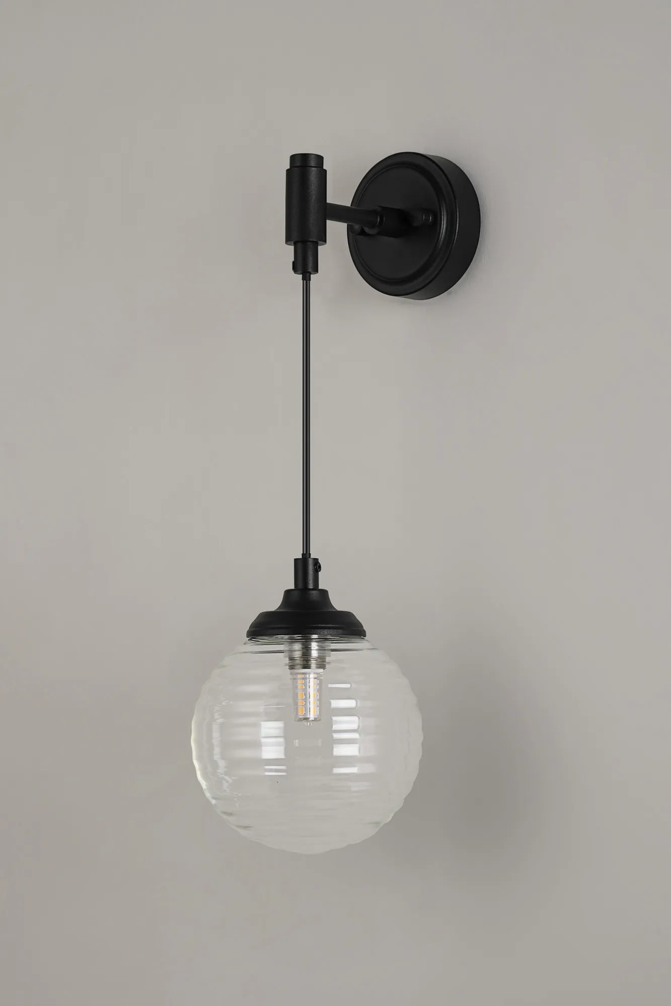 Dene Adjustable Single Wall Light IP44 - Satin Black & Clear Ribbed Round Glass