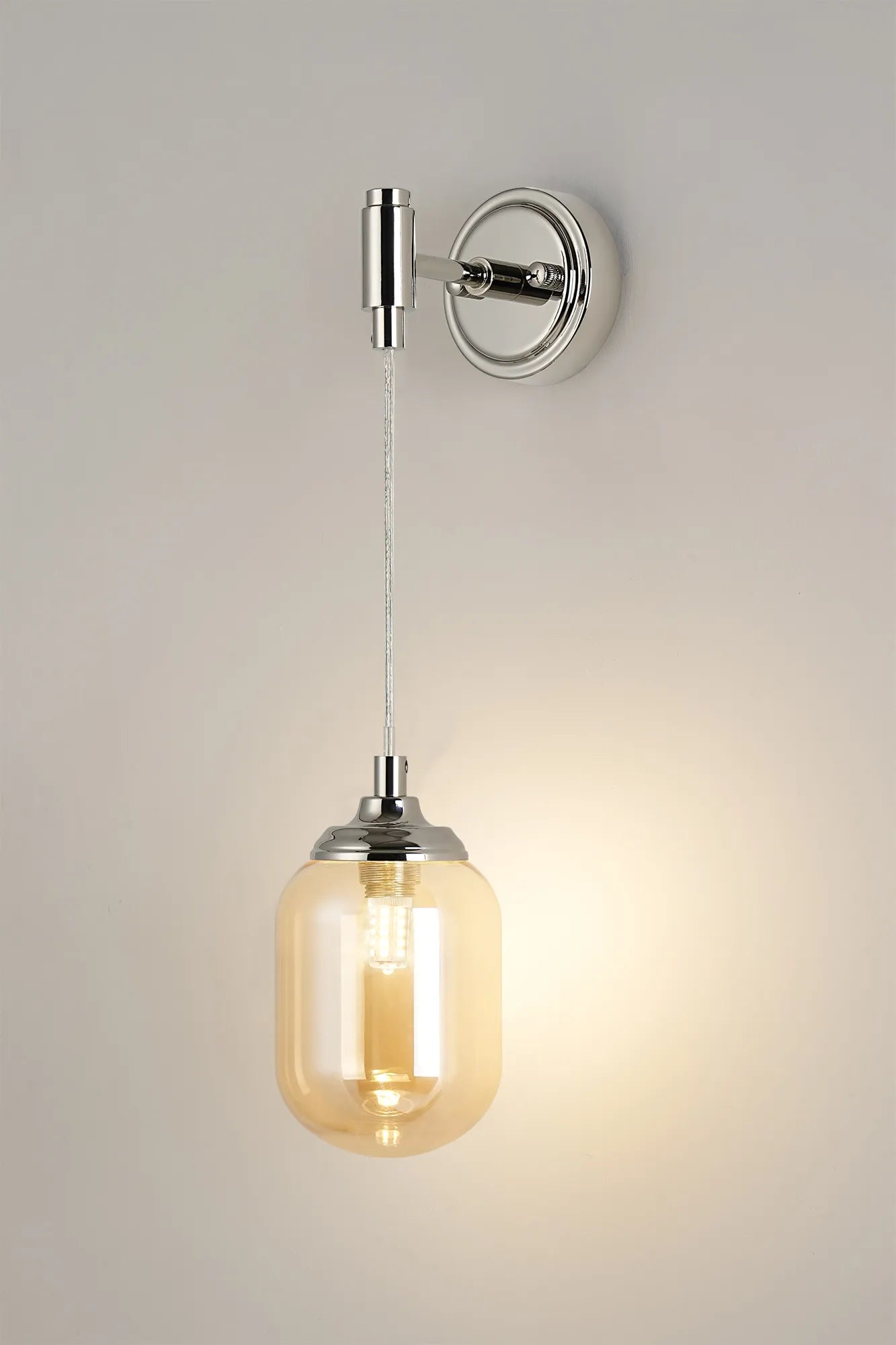 Dene Adjustable Single Wall Light IP44 - Polished Nickel & Amber Smooth Tubular Glass